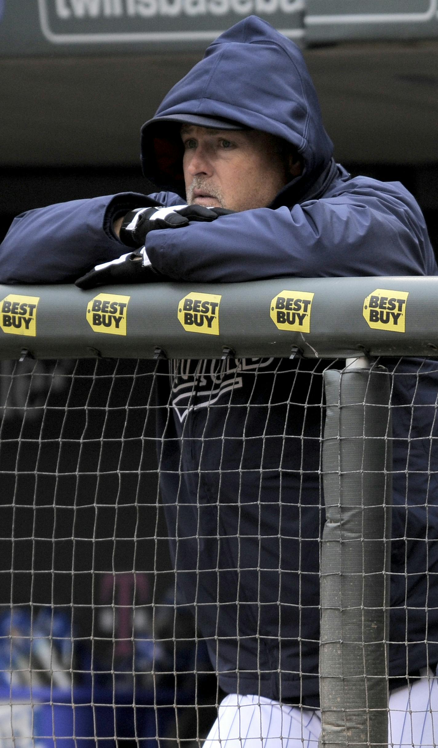 Minnesota Twins coaches Tom Brunansky, left and Terry Steinbach, right, during a baseball game against the Kansas City Royals in Minneapolis, Sunday, April 13, 2014. (AP Photo/Tom Olmscheid) ORG XMIT: NYOTK ORG XMIT: MIN1405031714494797 ORG XMIT: MIN1411042251555210