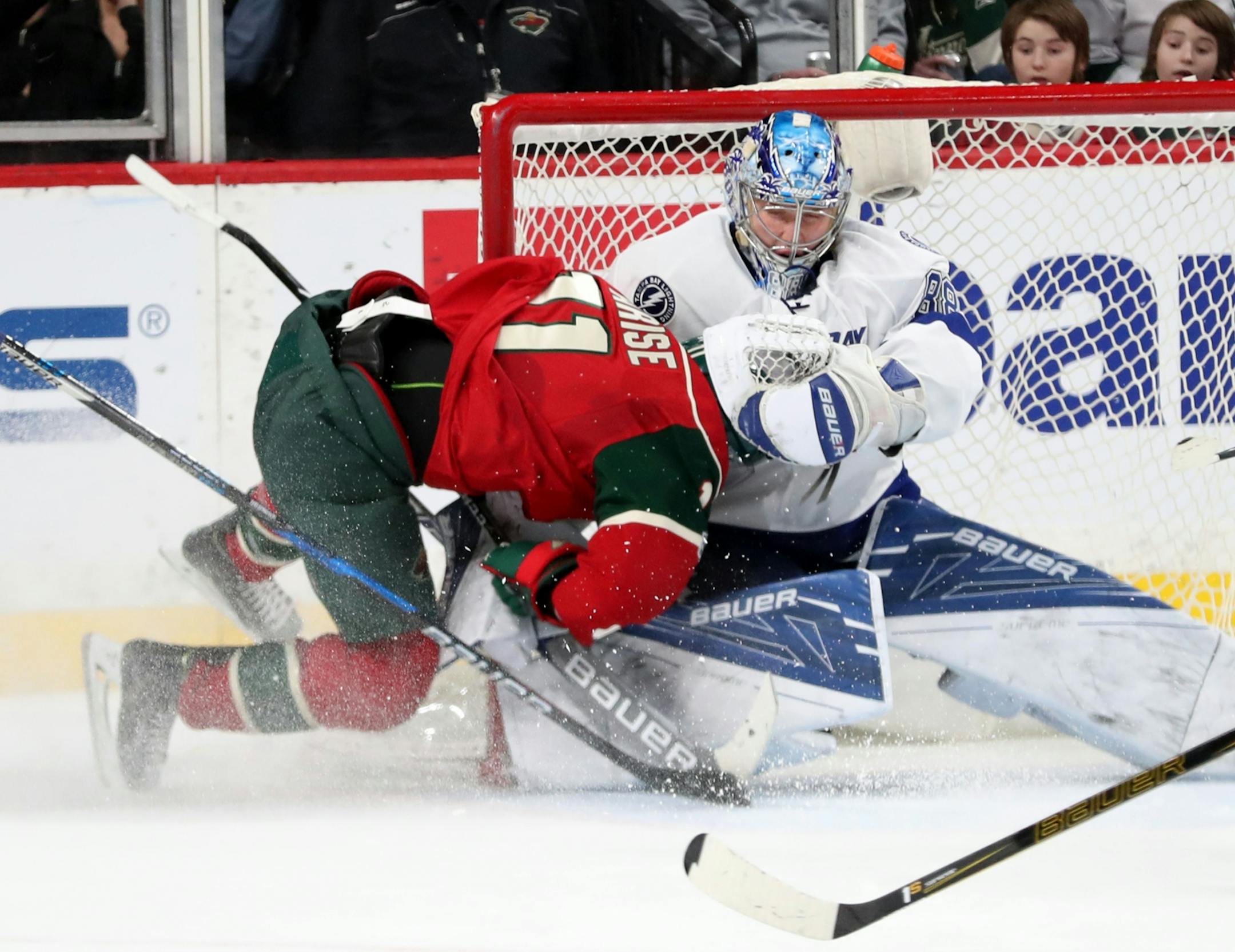 During a short-handed break away attempt the Minnesota Wild's Zach Parise (11) collied's with Tampa Bay goalie Andrei Vasilevskiy (88) in the second period of the Wild's 2-1 shootout win over Tampa Bay Friday, Feb. 10, 2017, at the Xcel Energy Center in St. Paul, MN.