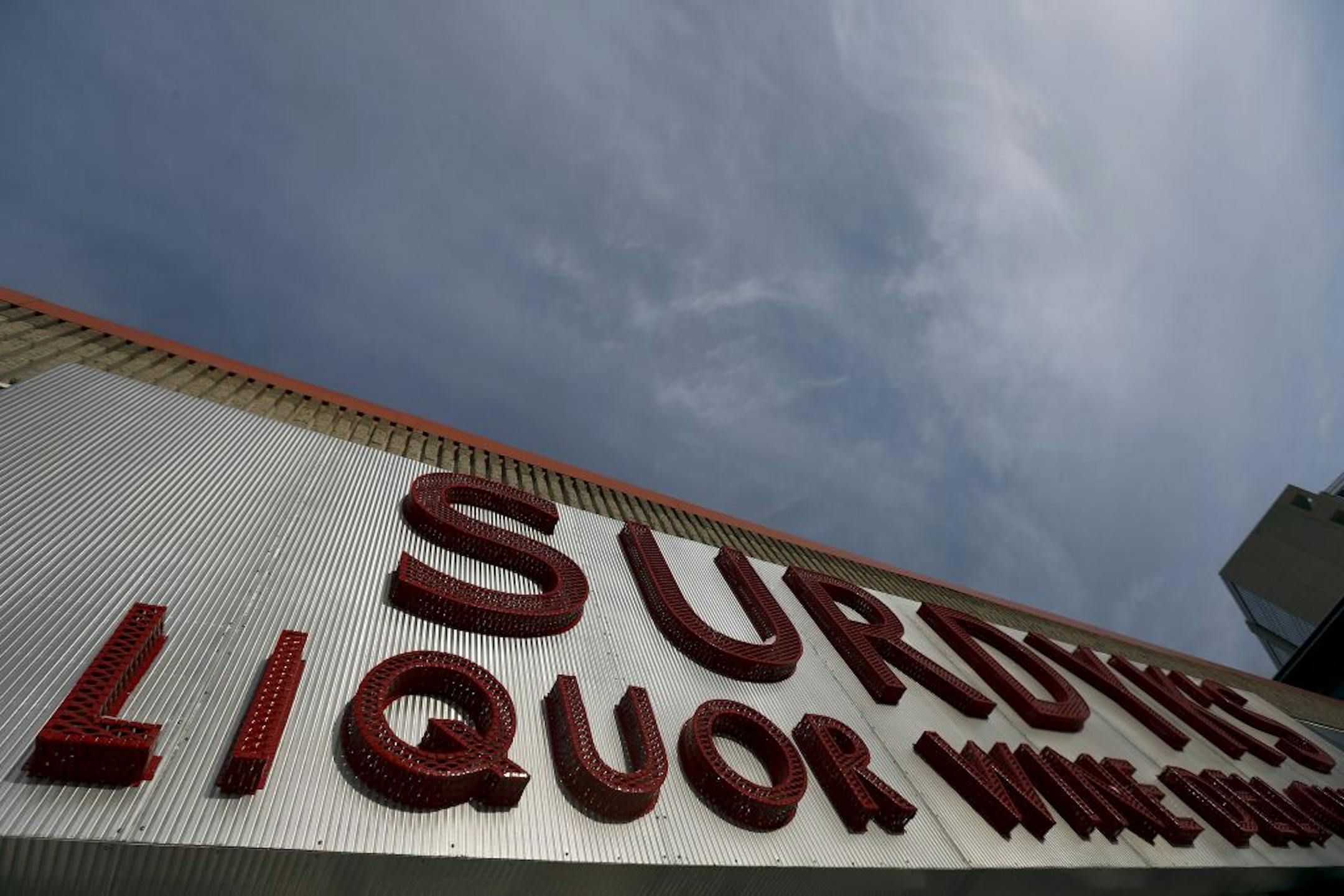 Some liquor store owners wonder if being open seven days a week would lead to increased sales; others don't want to give up their day off.