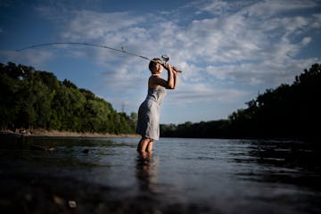 Autumn Xiong, of St. Paul spent Tuesday evening casting at Hidden Falls Regional Park in St. Paul.,Minn. on Tuesday Aug 23, 2022.