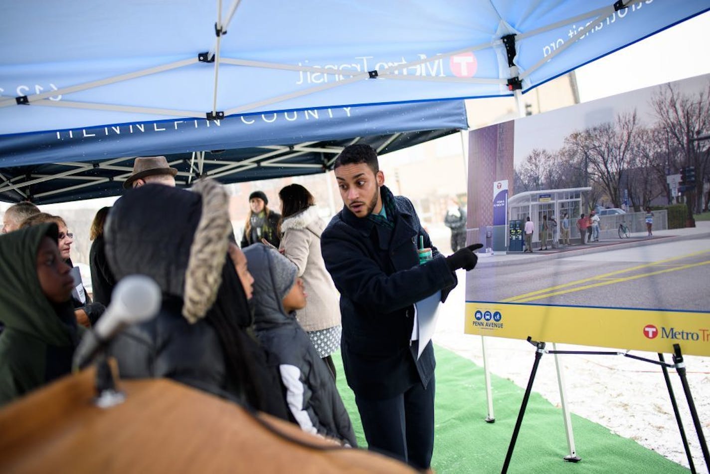 Minneapolis City Council member Phillipe Cunningham explained the the C-Line to students from Lucy Laney Elementary School before the start of Tuesday's groundbreaking ceremony.