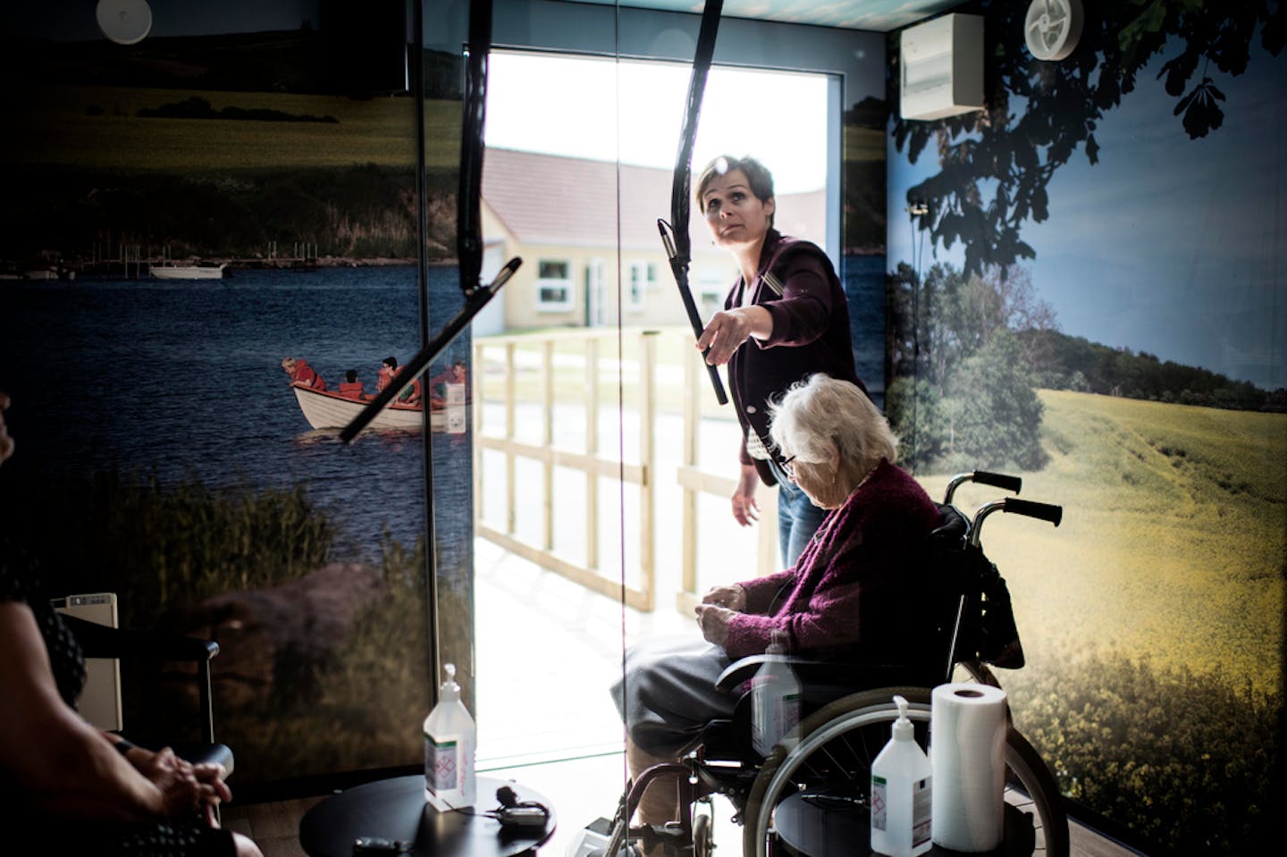 An elderly resident visited with relatives via microphone at a nursing home on the island of Funen, Denmark. Denmark, the best-performing stock market in Magni's study, ranks third in the Global COVID Index.