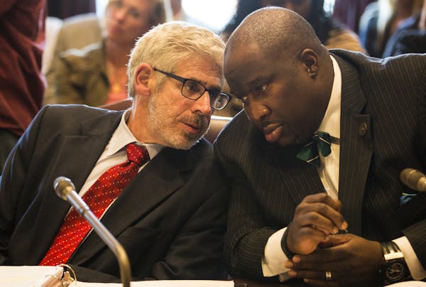Sen. Jeff Hayden, right, chatted with his lawyer Charlie Nauen during a Minnesota Senate committee Probable Cause Hearing regarding complaint filed re