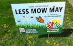 Roseville, which started promoting "Less Mow May" last year, created signs for participating residents to place on their lawns.