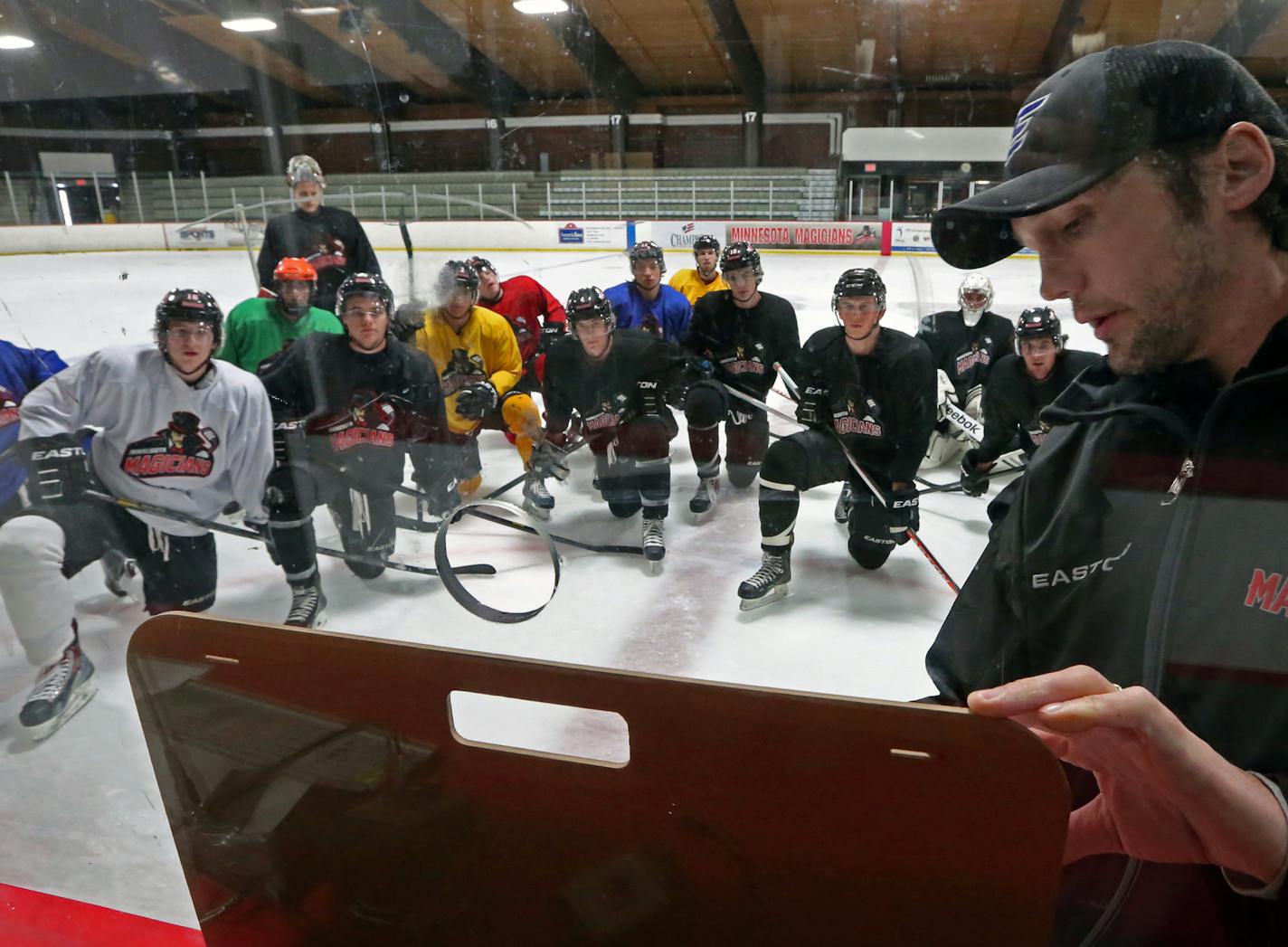 (right) Assistant Coach Shane Wagner explained a drill as the Minnesota Magicians hockey team practiced at the Richfield Ice Arena on 12/26/13.] Bruce Bisping/Star Tribune bbisping@startribune.com Shane Wagner/source.