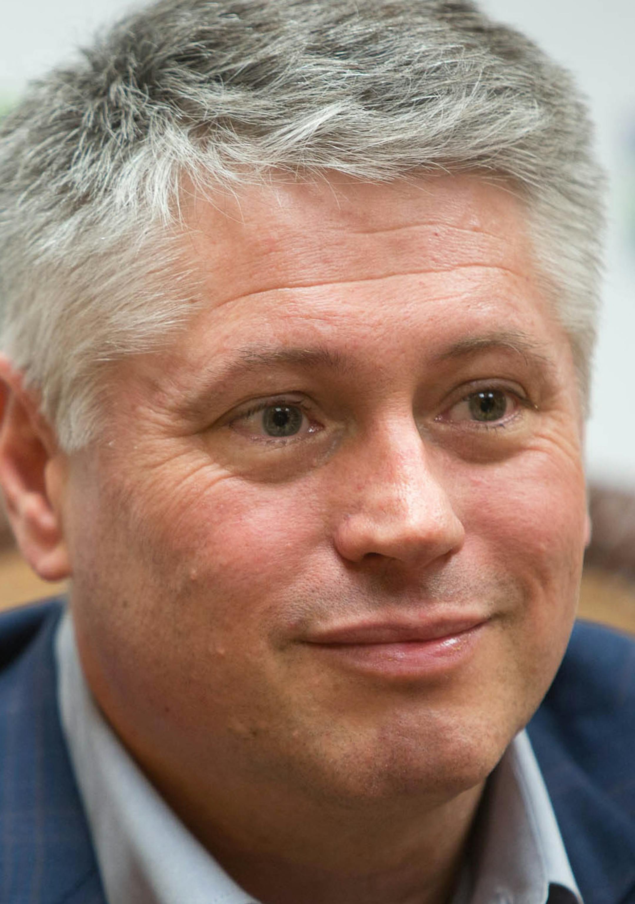 FILE - In this April 25, 2013 file photo, Wayzata businessman Scott Honour, a Republican who will run for governor in 2014, listens during an interview in St. Paul, Minn. Honour is one of three Republicans hoping to oust Democratic Gov. Mark Dayton who believe Minnesota's problem-ridden health insurance exchange is an unmitigated disaster but each differ on what they would put in MNsure's place if they take over next year. (AP Photo/Minnesota Public Radio, Jennifer Simonson, File)