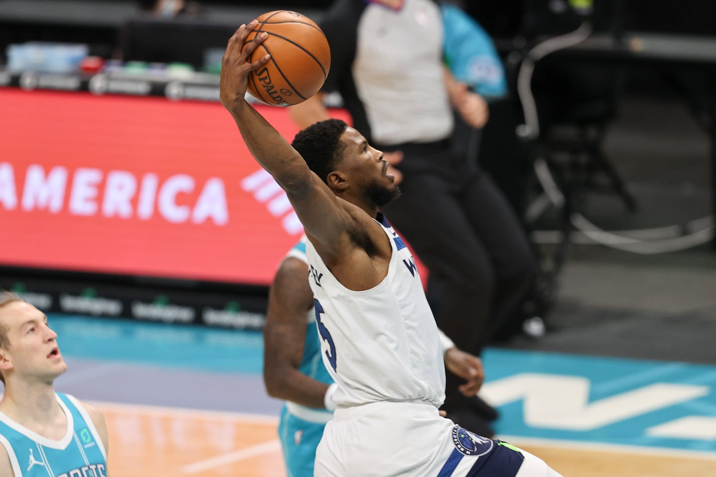 Timberwolves guard Malik Beasley drives to the basket against Charlotte