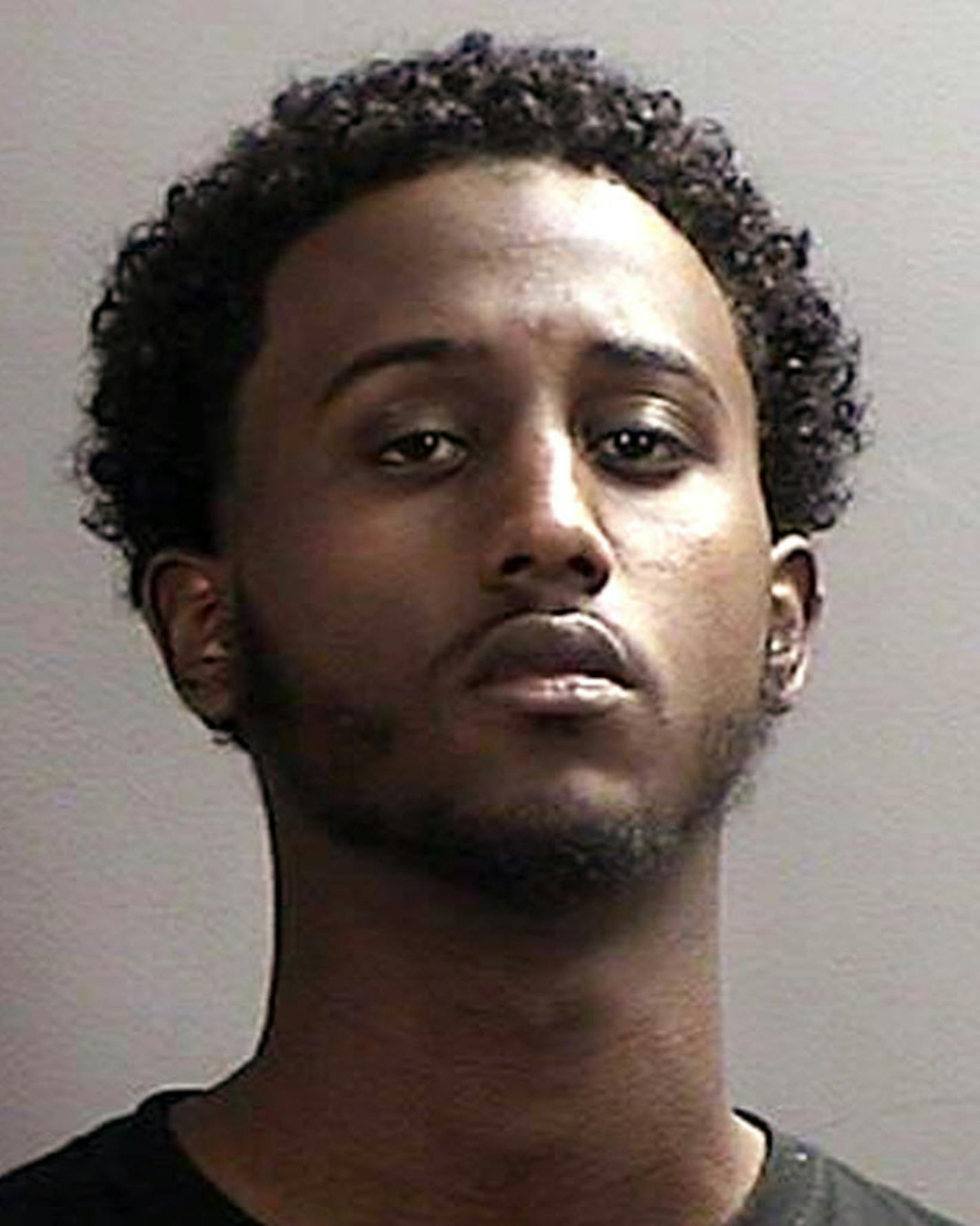 FILE - This file photo provided April 21, 2015 by the Sherburne County, Minnesota, Sheriff&#xed;s Office shows Hanad Mustafe Musse, 19. Musse is among seven Minnesota men of Somali descent that have been charged in a indictment with traveling or attempting to travel to Syria to join the Islamic State group, which has carried out a host of attacks including beheading Americans. (Sherburne County Sheriff&#xed;s Office via AP, File)