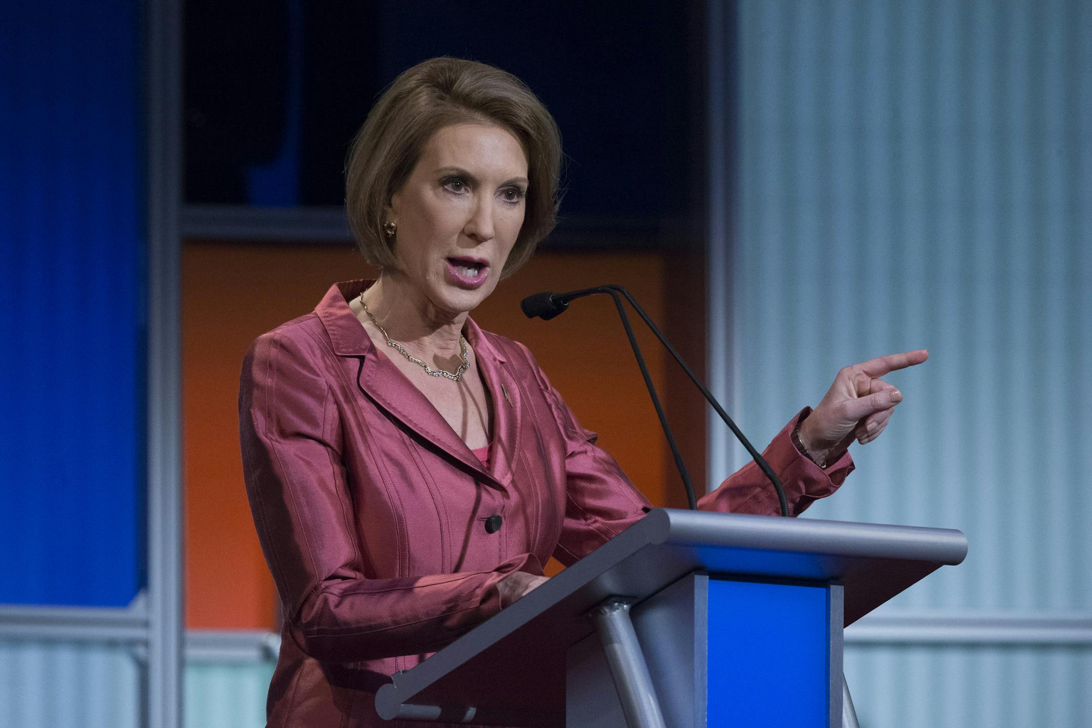 Republican presidential candidate Carly Fiorina participates a pre-debate forum at the Quicken Loans Arena, Thursday, Aug. 6, 2015, in Cleveland. Seven of the candidates have not qualified for the primetime debate. (AP Photo/John Minchillo)
