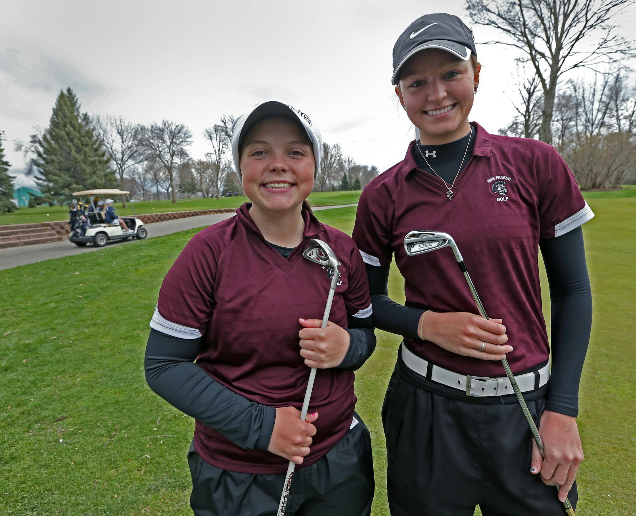 (left to right) New Prague's girls golf team members, Taylor Ledwein and Kenzie Neisen, photographed on 5/2/14. The New Prague's girls' golf team hosted a Missota Conference meet at the New Prague Golf Club starting at 2 p.m..] Bruce Bisping/Star Tribune bbisping@startribune.com Taylor Ledwein, Kenzie Neisen/source.