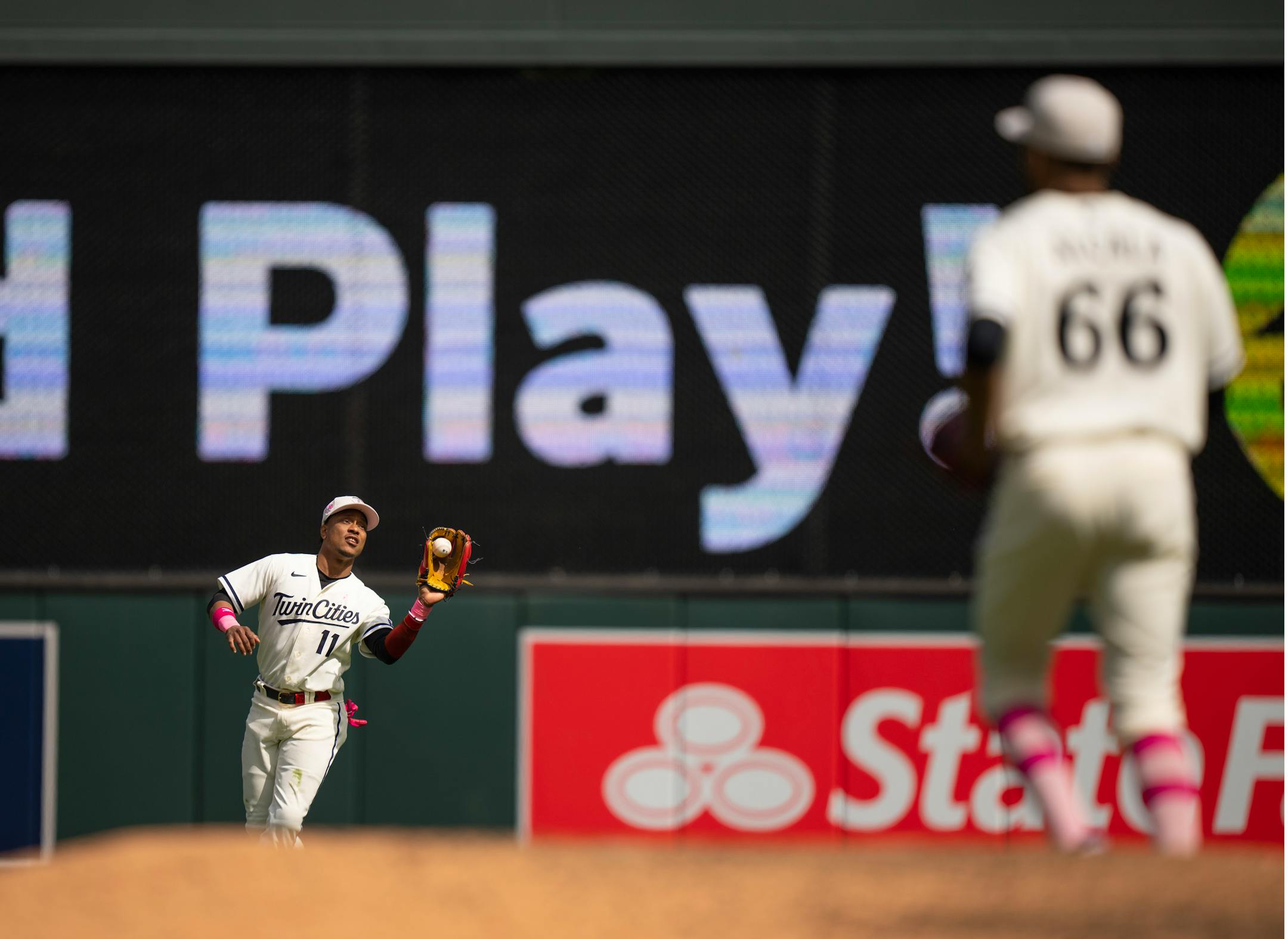Minnesota Twins second baseman Jorge Polanco caught a line drive by Chicago Cubs third baseman Patrick Wisdom for a ninth inning out.