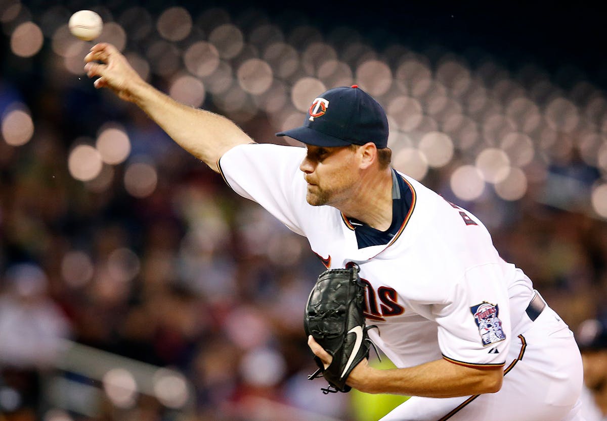 Minnesota Twins starting pitcher Mike Pelfrey (37) in the first inning.