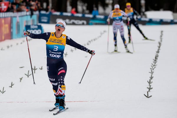 United States' Jessie Diggins celebrates winning a cross-country ski sprint event at the FIS Tour de Ski in Lenzerheide, Switzerland, Tuesday, Dec. 28