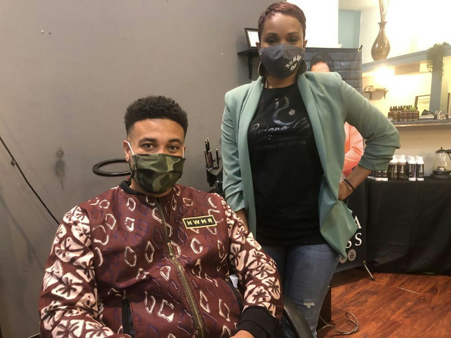 Marcus Owens of the African American Leadership Forum and the Black Business Support Collective, with Briana Cress of Gorgeous Looks Salon in Minneapolis. PHOTO: Neal.St.Anthony@startribune.com