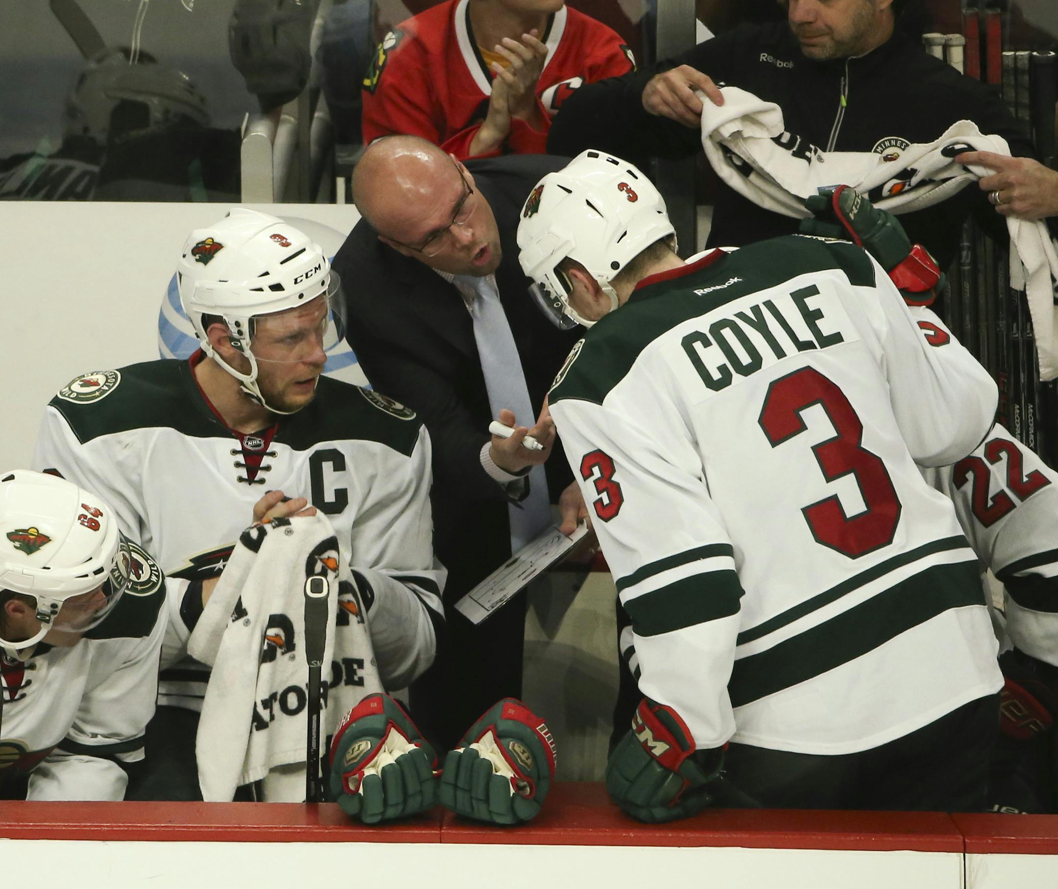 Minnesota Wild head coach Mike Yeo called a timeout during the third period to talk with center Mikael Granlund (64), center Mikko Koivu (9), center Charlie Coyle (3) and right wing Nino Niederreiter (22) late in the game Sunday night at United Center in Chicago. ] JEFF WHEELER ‚Ä¢ jeff.wheeler@startribune.com The Minnesota Wild faced the Chicago Blackhawks in game 5 of their playoff series Sunday night, May 11, 2014 at United Center in Chicago.