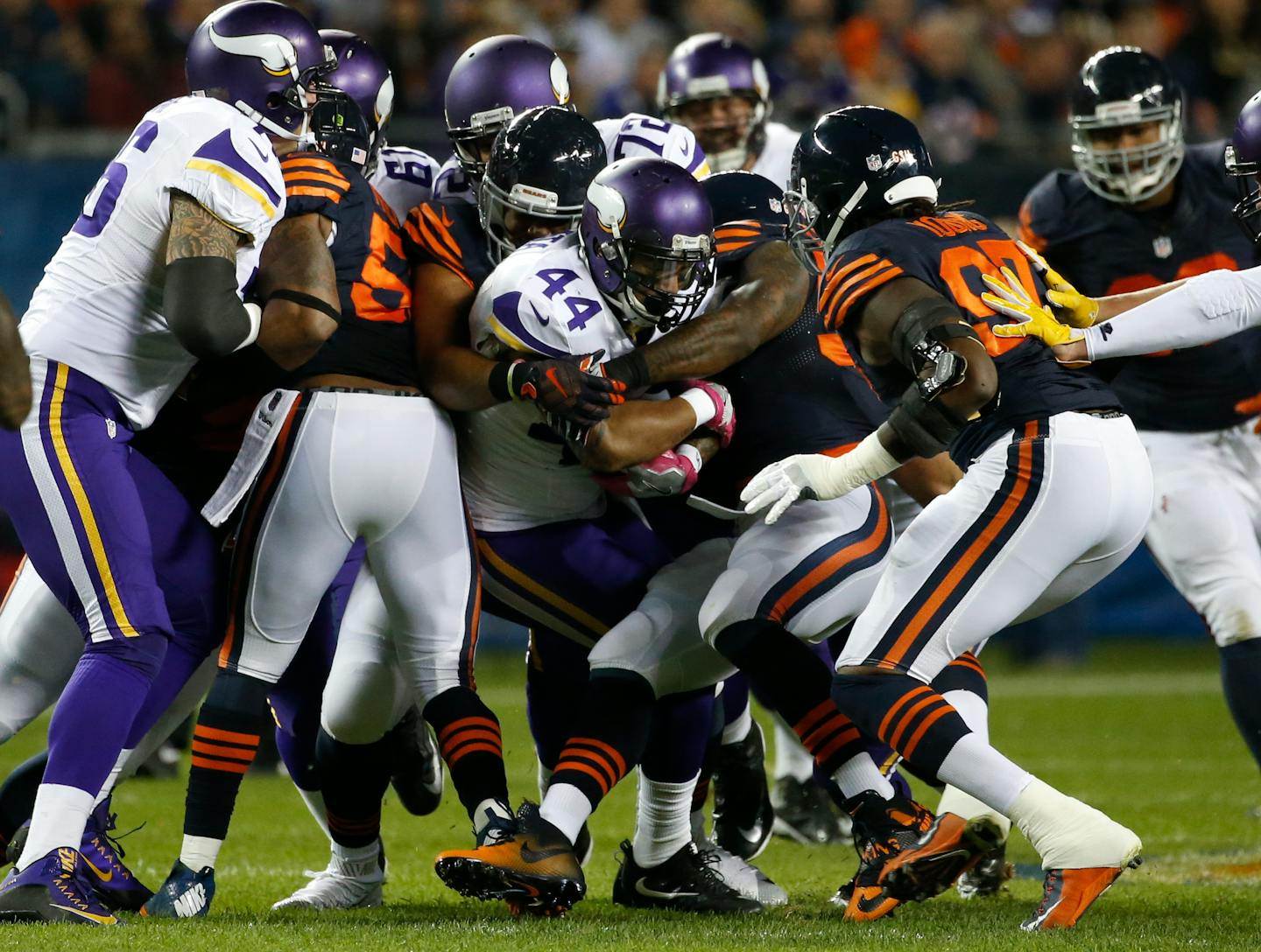 Vikings running back Matt Asiata (44) was stopped by the Bears defense during the first half Monday.