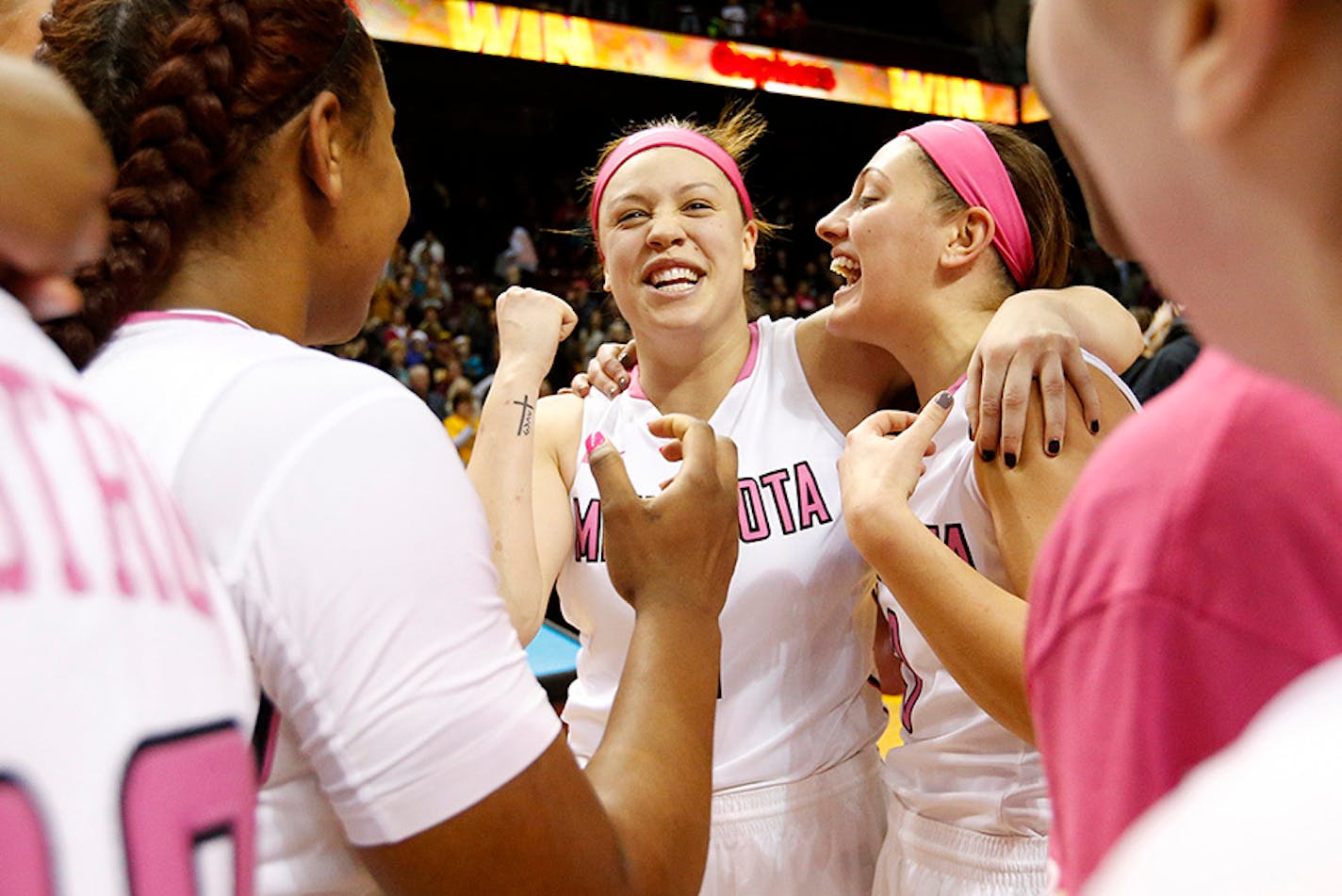 Rachel Banham (1) celebrated with teammates at the end of the game.