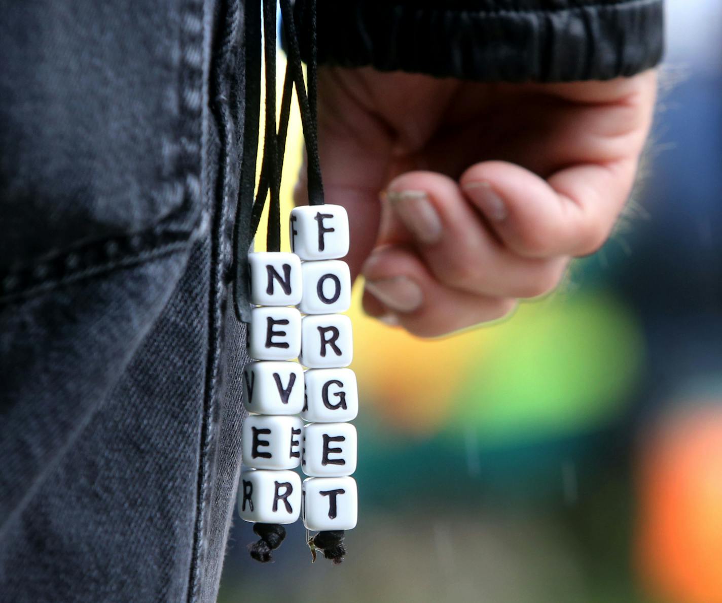 The Minnesota Military Family Tribute dedication ceremony was held Saturday, June 13, 2015, on the State Capitol Grounds in St. Paul, MN. Here, a message hung from the belt of a member of the Patriot Guard. ](DAVID JOLES/STARTRIBUNE)djoles@startribune.com The Minnesota Military Family Tribute will be dedicated to Minnesota military families on the Minnesota State Capitol Grounds.