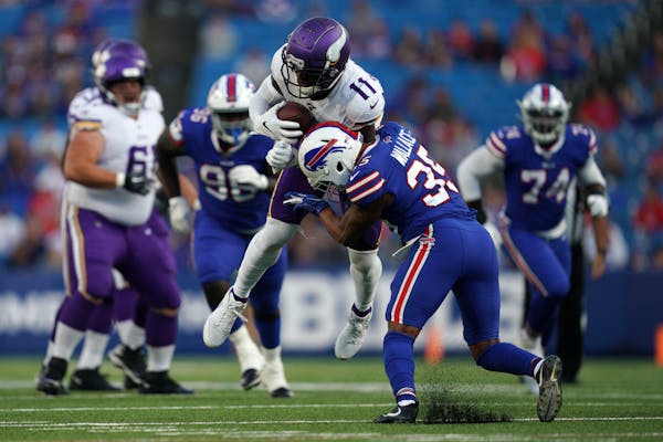 Vikings wide receiver Laquon Treadwell was lifted off his feet by Buffalo defensive back Abraham Wallace in the first half.
