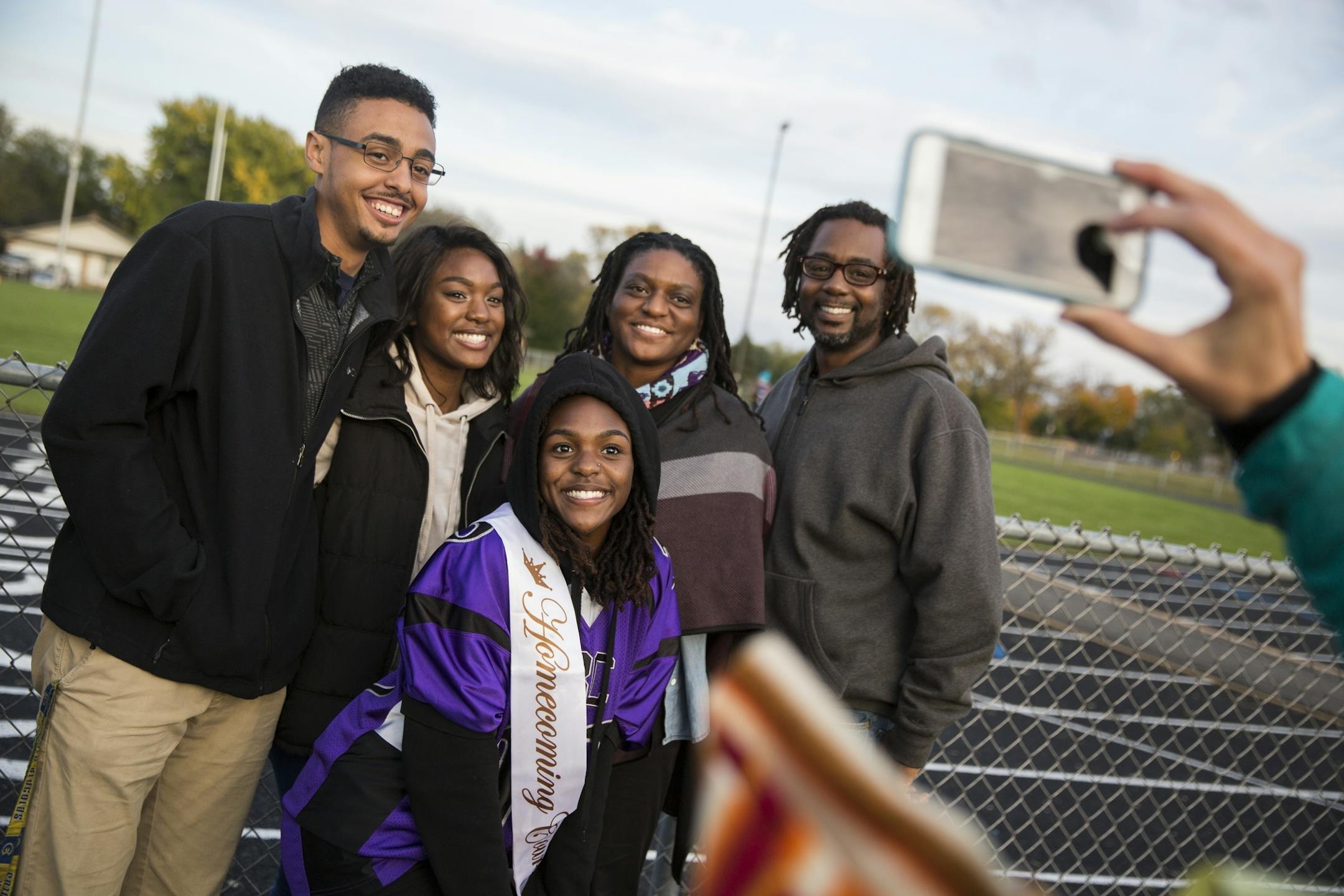 Nia Ford, front center, poses for a photo with her family, from right, father Minkara Tezet, mother Kiwana Allbritton, sister Nala Ford and brother-in-law Larrick Potvin.
