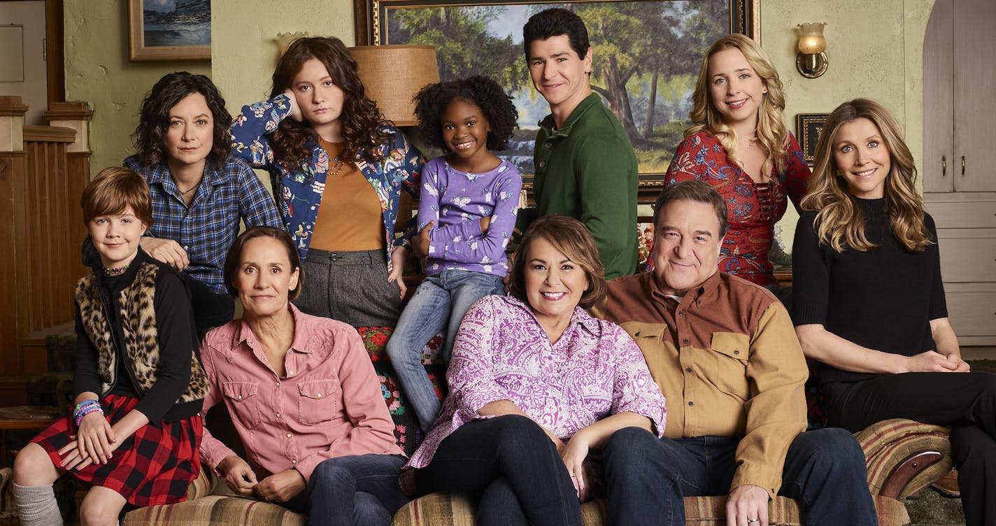 ROSEANNE - ABC's "Roseanne" stars Ames McNamara as Mark, Sara Gilbert as Darlene Conner, Laurie Metcalf as Jackie Harris, Emma Kenney as Harris Conner, Jayden Rey as Mary, Roseanne Barr as Roseanne Conner, Michael Fishman as D.J. Conner, John Goodman as Dan Conner, Lecy Goranson as Becky Conner, and Sarah Chalke as Andrea. (ABC/Robert Trachtenberg)