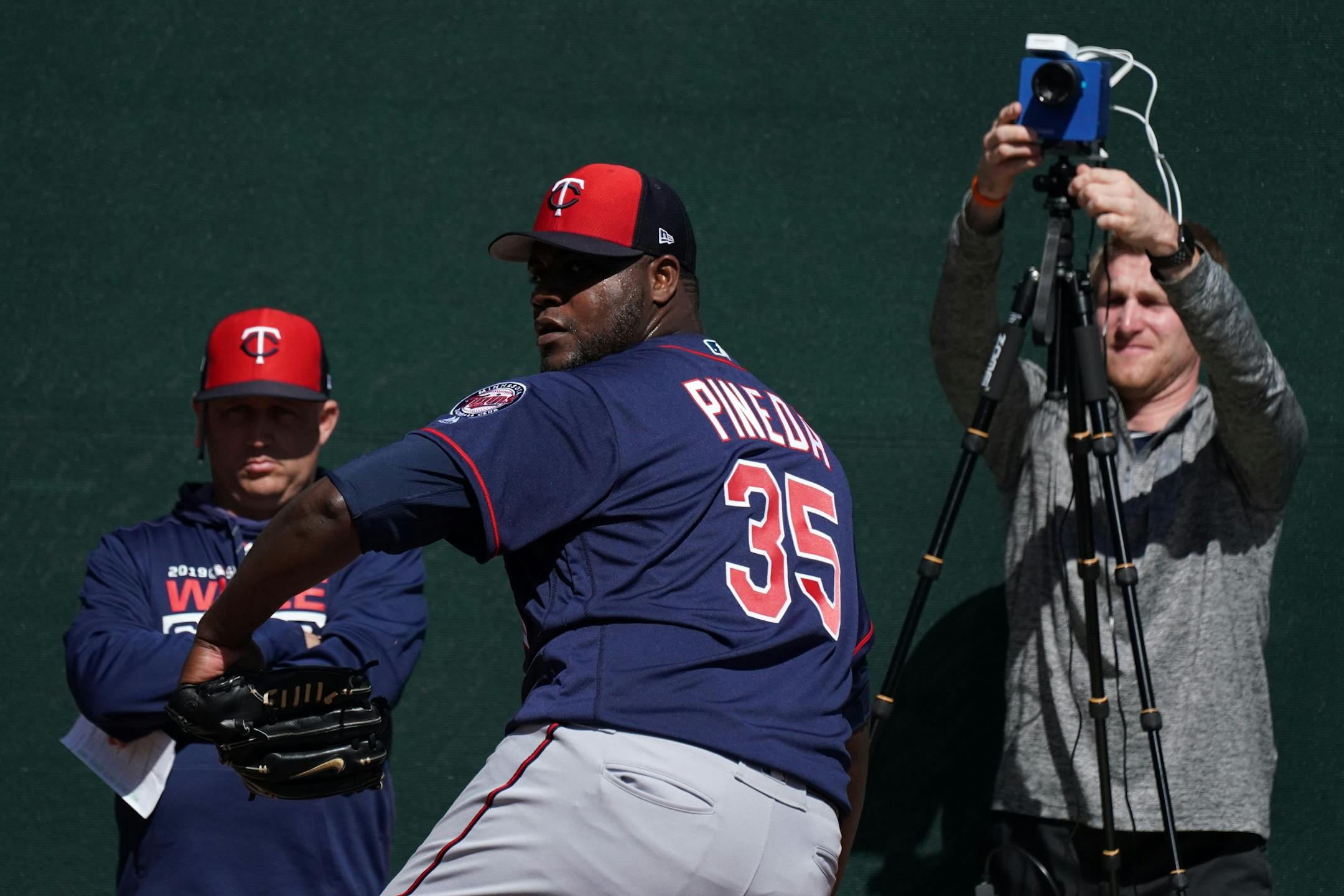 Twins pitcher Michael Pineda (35) worked out under the watchful eye of pitching coach Wes Johnson in the bullpen Thursday morning.