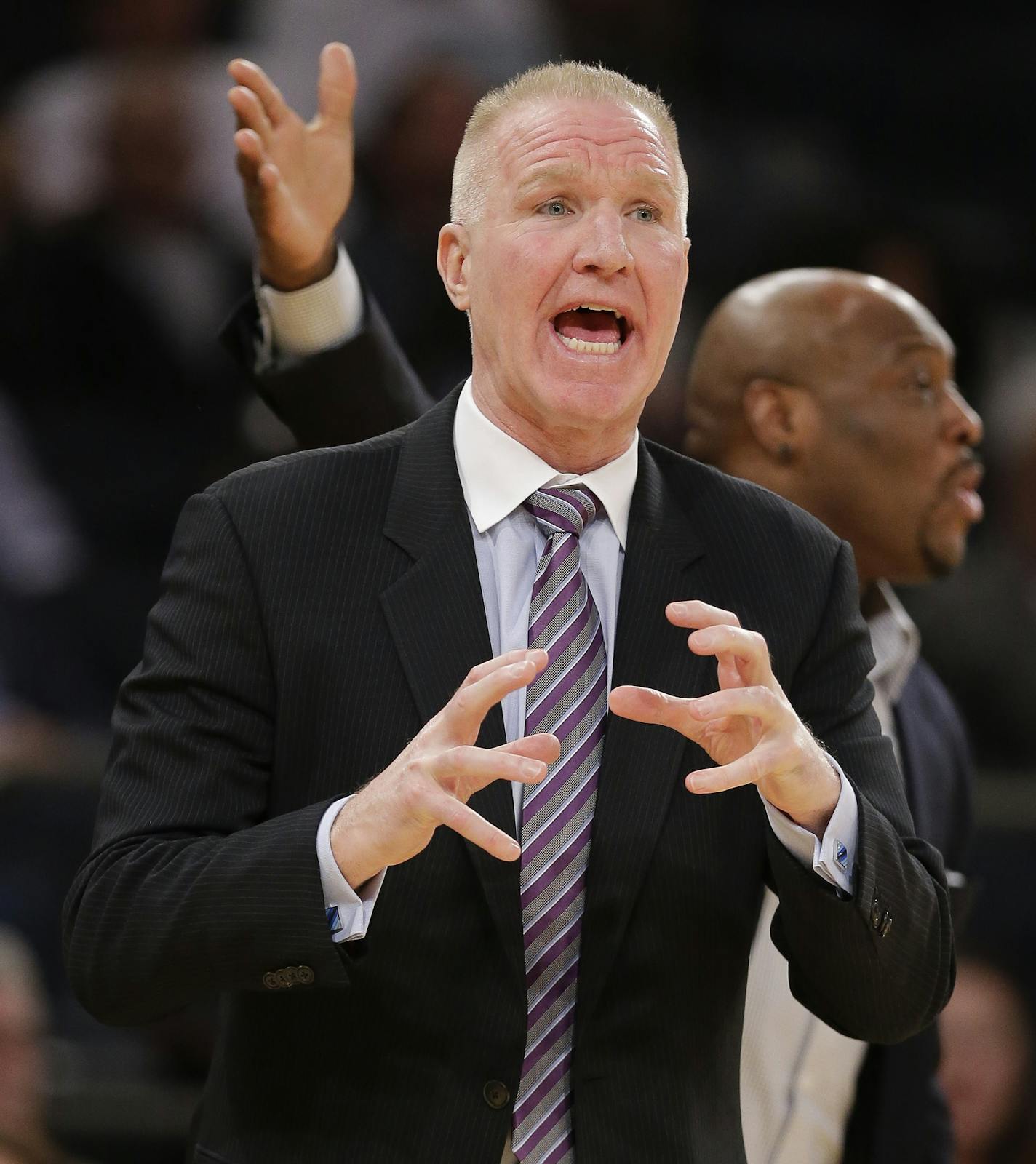 St. John's head coach Chris Mullin motions to players in the first half of an NCAA college basketball game against Marquette during the Big East men's tournament, Wednesday, March 9, 2016, in New York. (AP Photo/Julie Jacobson) ORG XMIT: NYJJ123