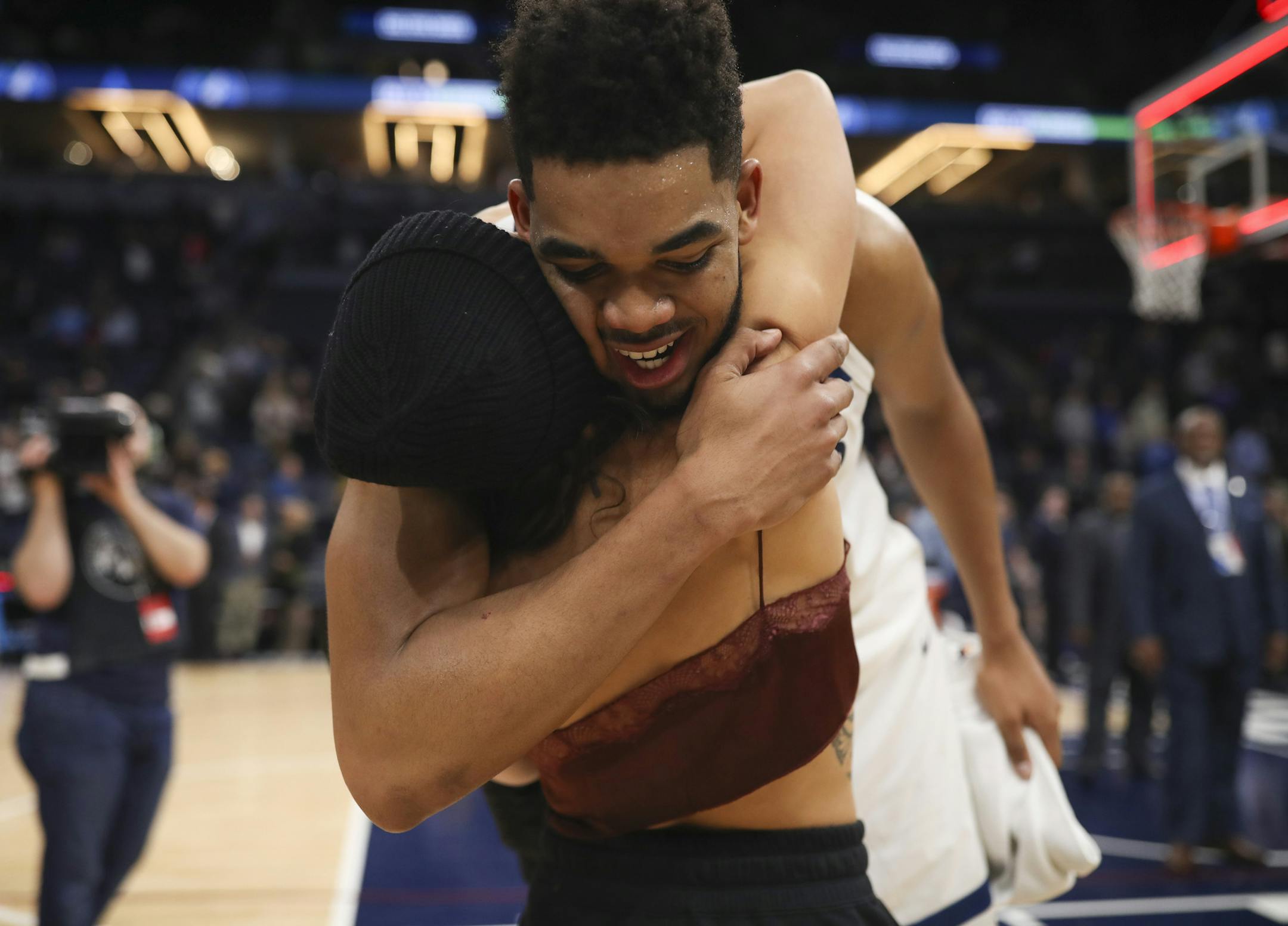 Minnesota Timberwolves center Karl-Anthony Towns (32) hugged his girlfriend on his way off the court after he set a franchise record with his 56 point effort over the Hawks. ] JEFF WHEELER ï jeff.wheeler@startribune.com The Minnesota Timberwolves beat the Atlanta Hawks 126-114 in an NBA basketball game Wednesday night, March 28, 2018 at Target Center in Minneapolis.