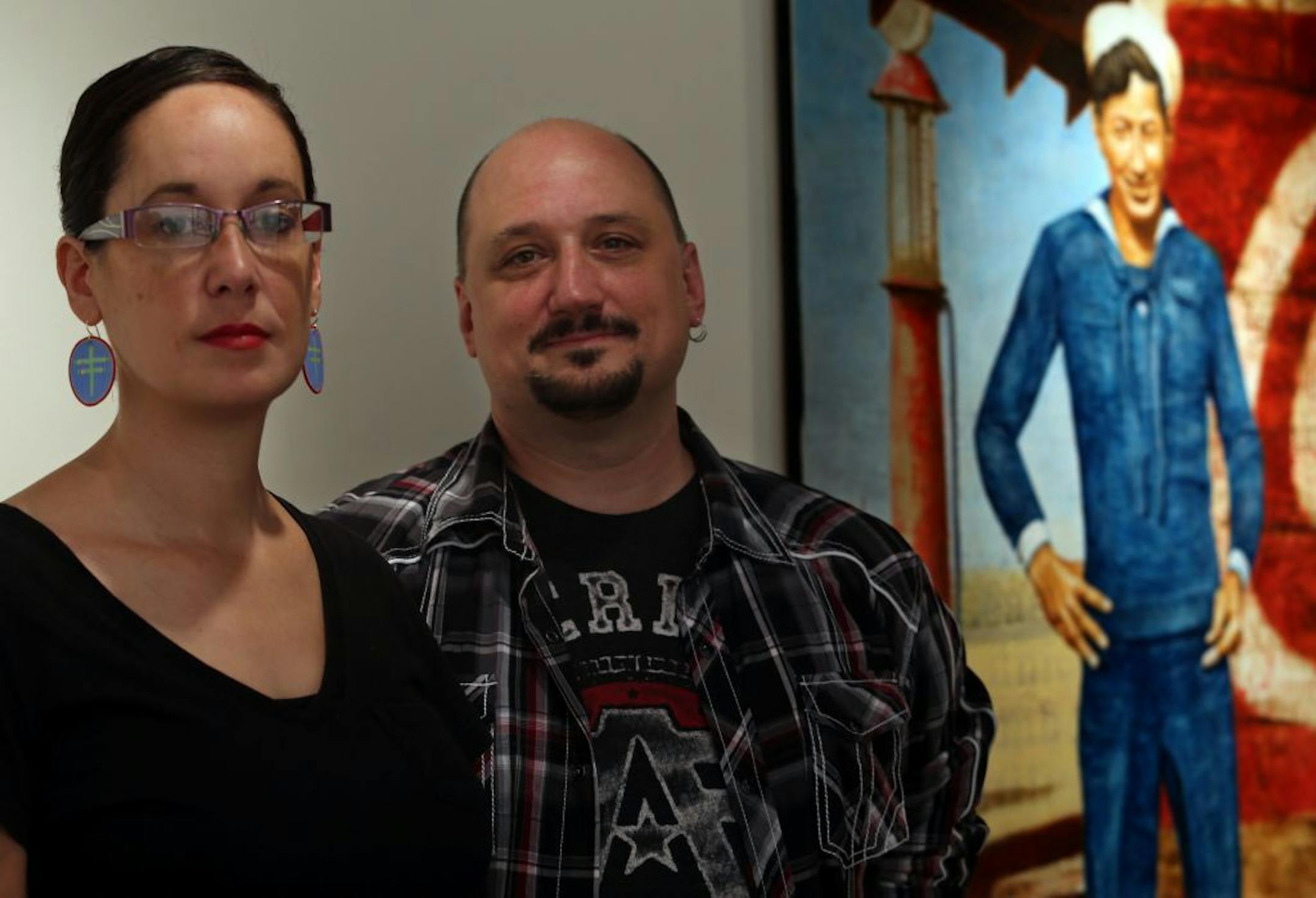 Dyani Whitehawk, a Minneapolis artist and director of All My Relations Gallery (left) and Native American artist Greg Bellanger in Minneapolis MN on September 25, 2013.