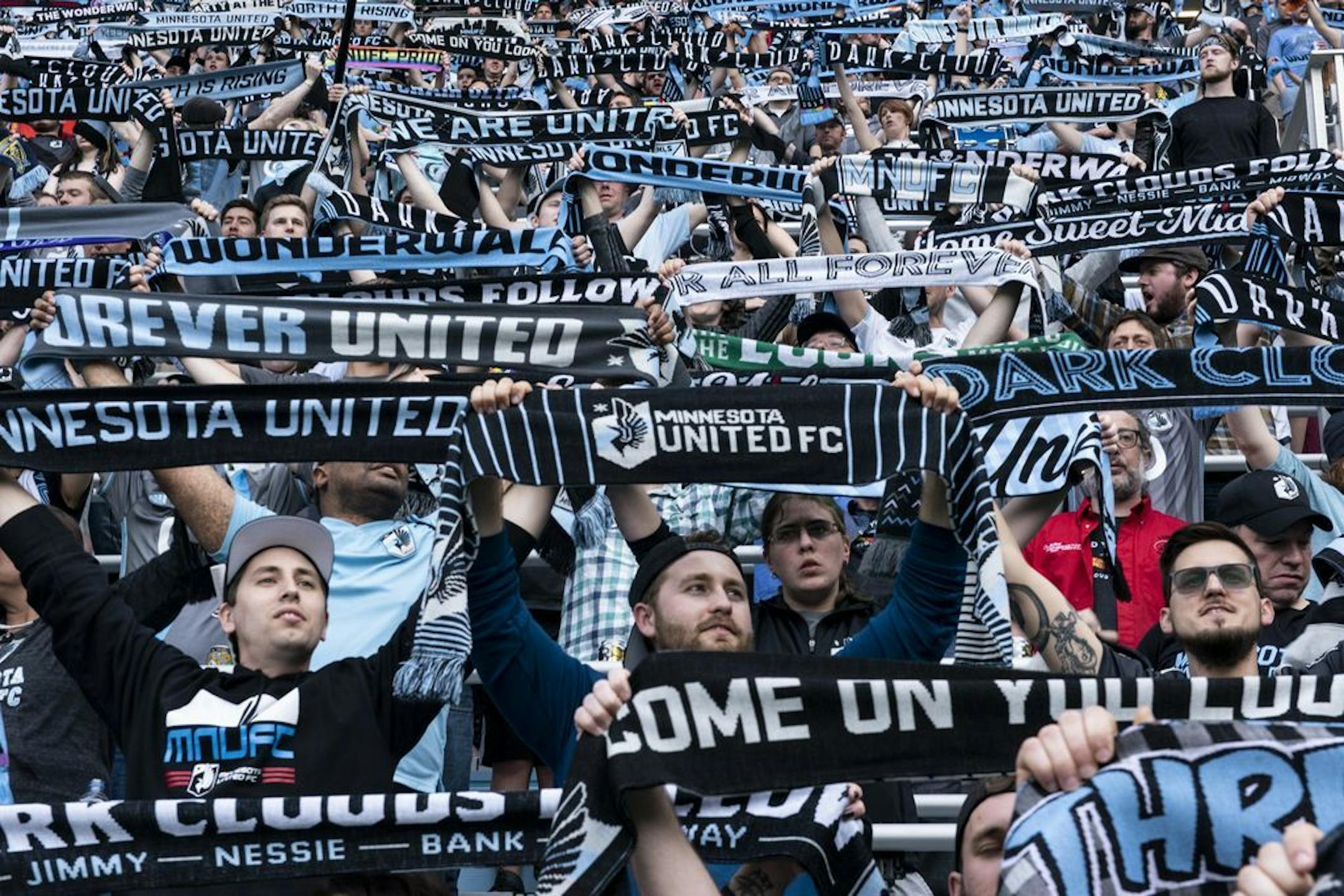 Minnesota United fans held up their scarves before Saturday night's game against the Seattle Sounders.