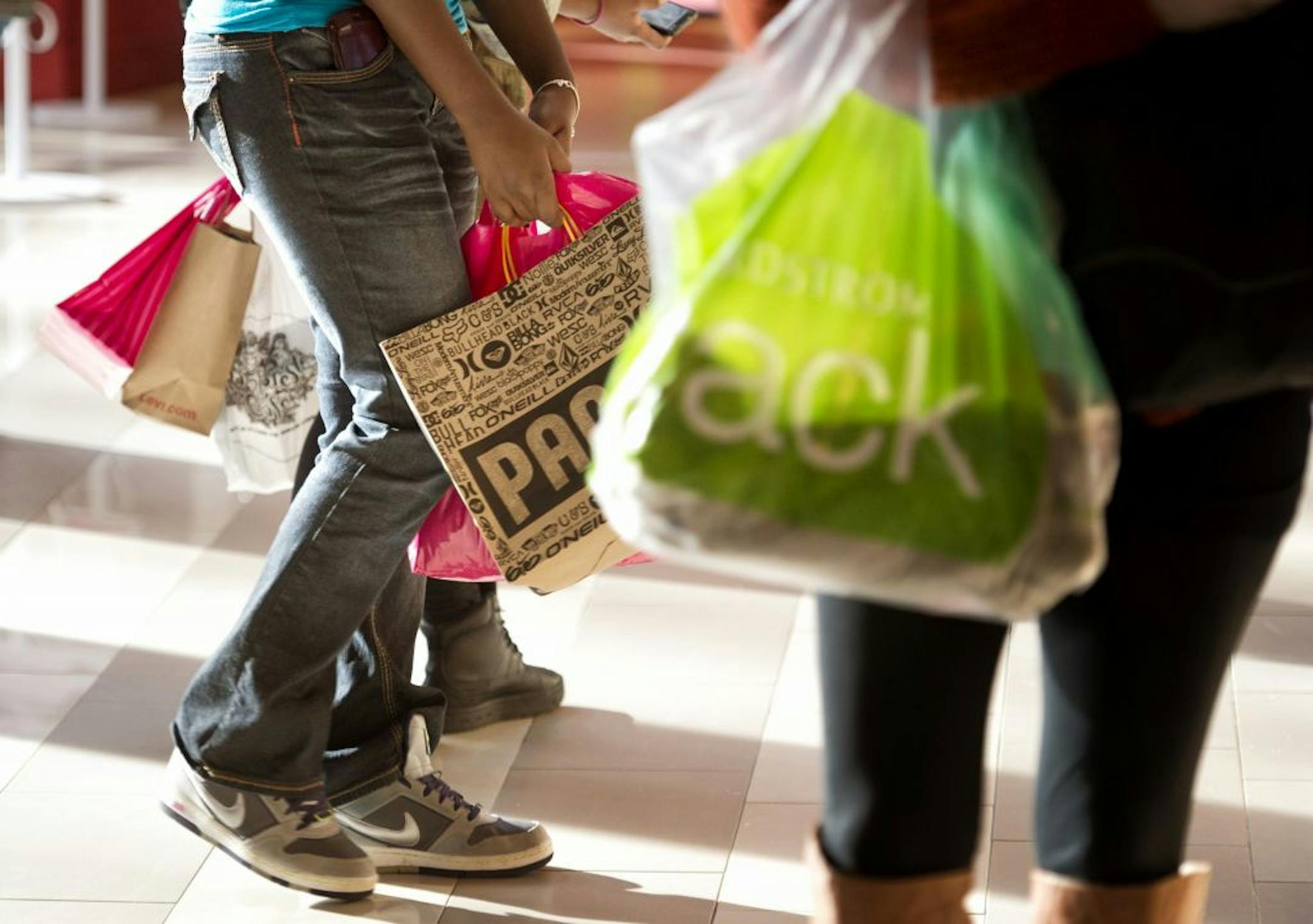 Kailin Spencer and Sherrell Williams, from Ames, Iowa, left, shopped the Mall of America, Wednesday, November 14, 2012