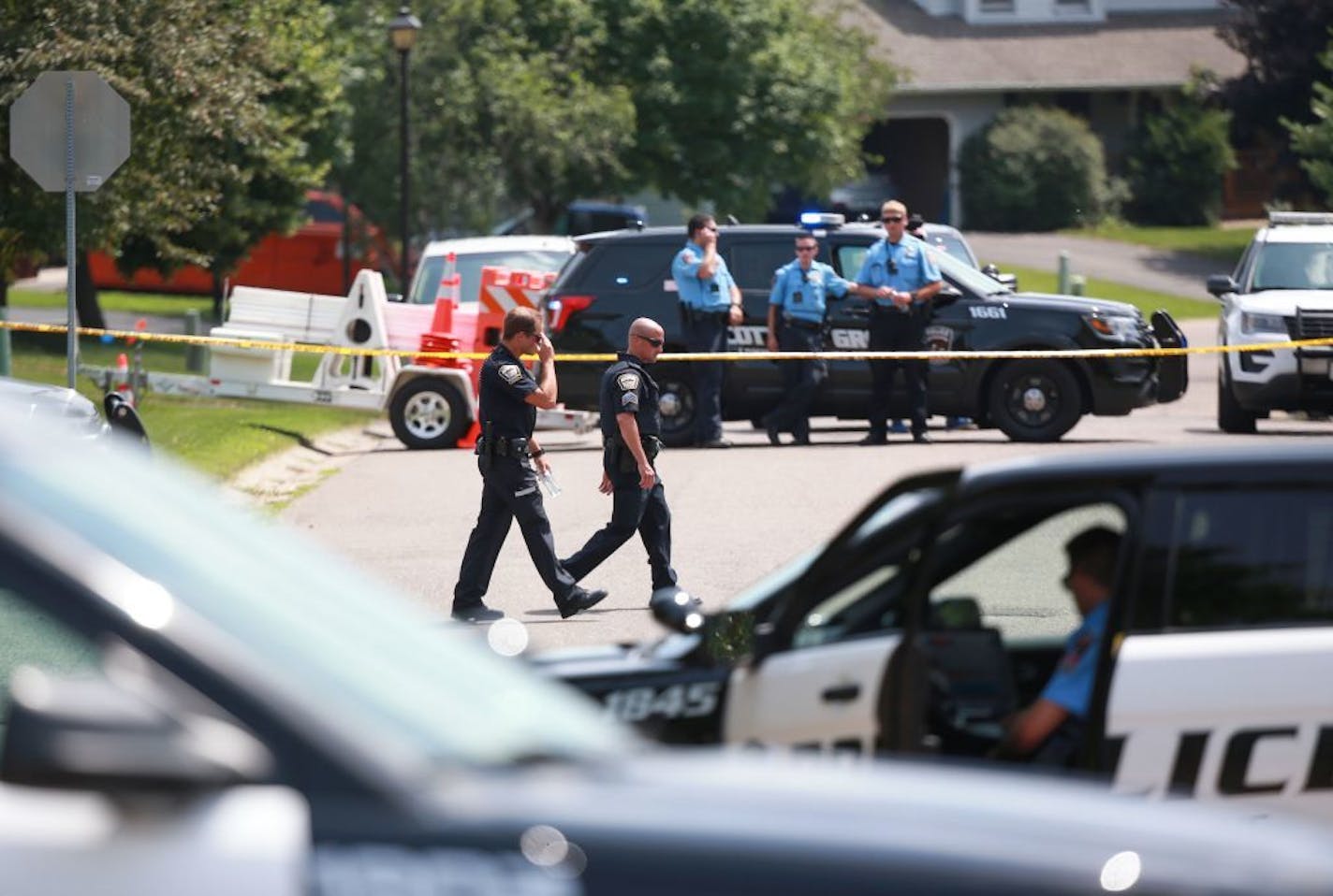 Police closed off the intersection of Highpointe Road and Windsor Lane following an officer-involved shooting in Woodbury late Sunday morning, July 14. ALEX KORMANN ¥ alex.kormann@startribune.com An black man was shot by police on Sunday July 14, 2109 in the Woodbury neighborhood of St. Paul, Mn.