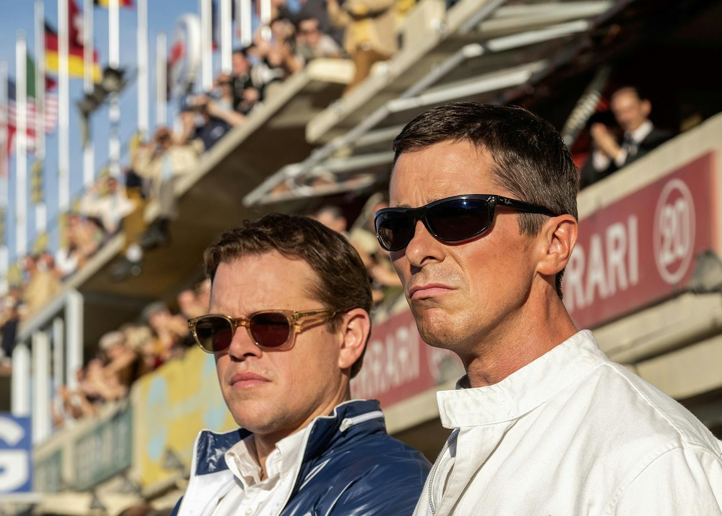 Matt Damon, left, and Christian Bale in the movie "Ford v. Ferrari." (Merrick Morton/20th Century Fox/TNS) ORG XMIT: 1541063