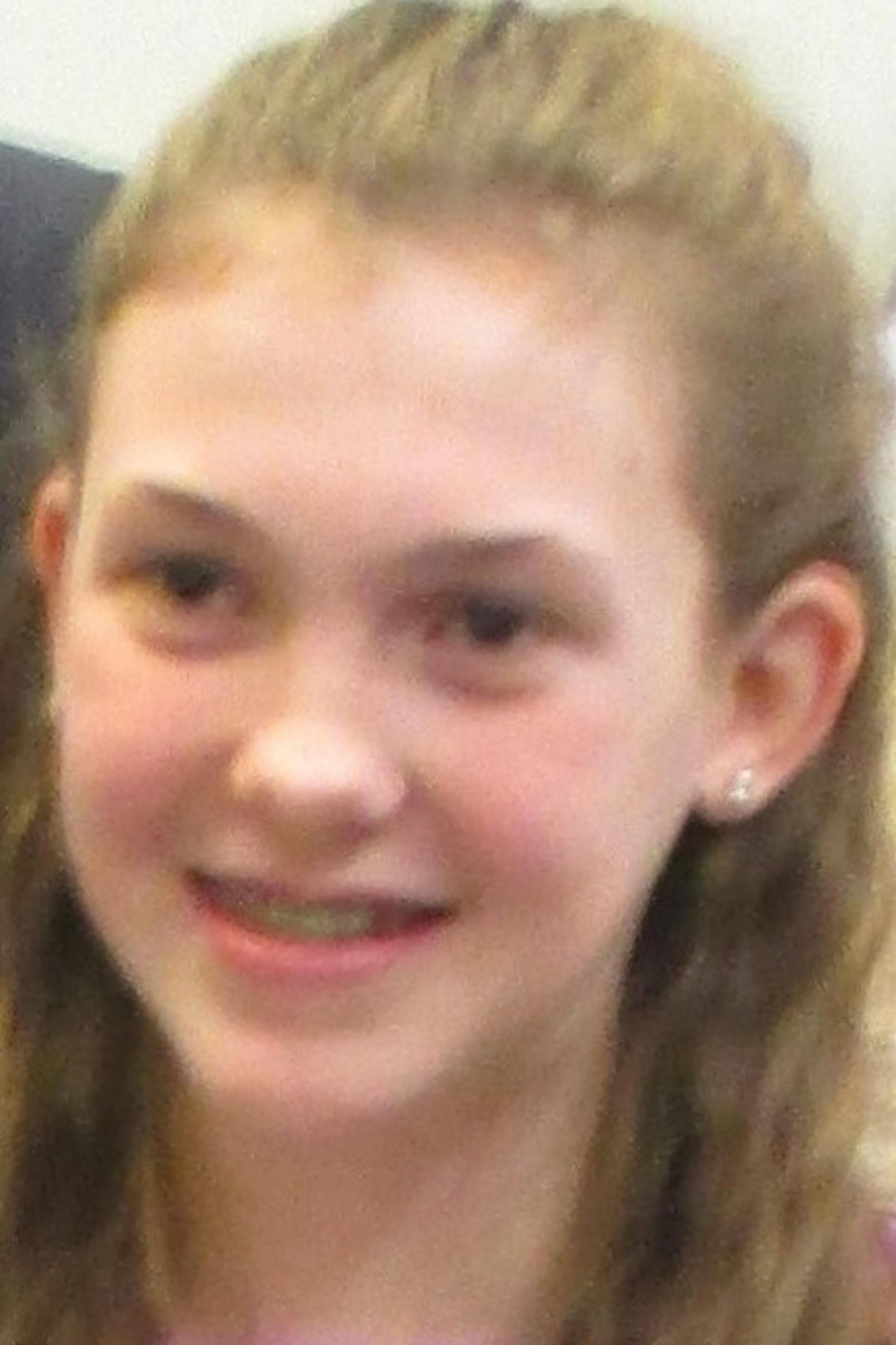 Helena Dowler, of Crosswinds Middle School, with her parents Amy Stedman and Greg Dowler.