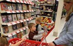 Abram Tennessen, 4, asked his mother Sarah Tennessen, of Burnsville, if he could get a movie as they shopped at Target Thursday, April 5, 2012, in Bur