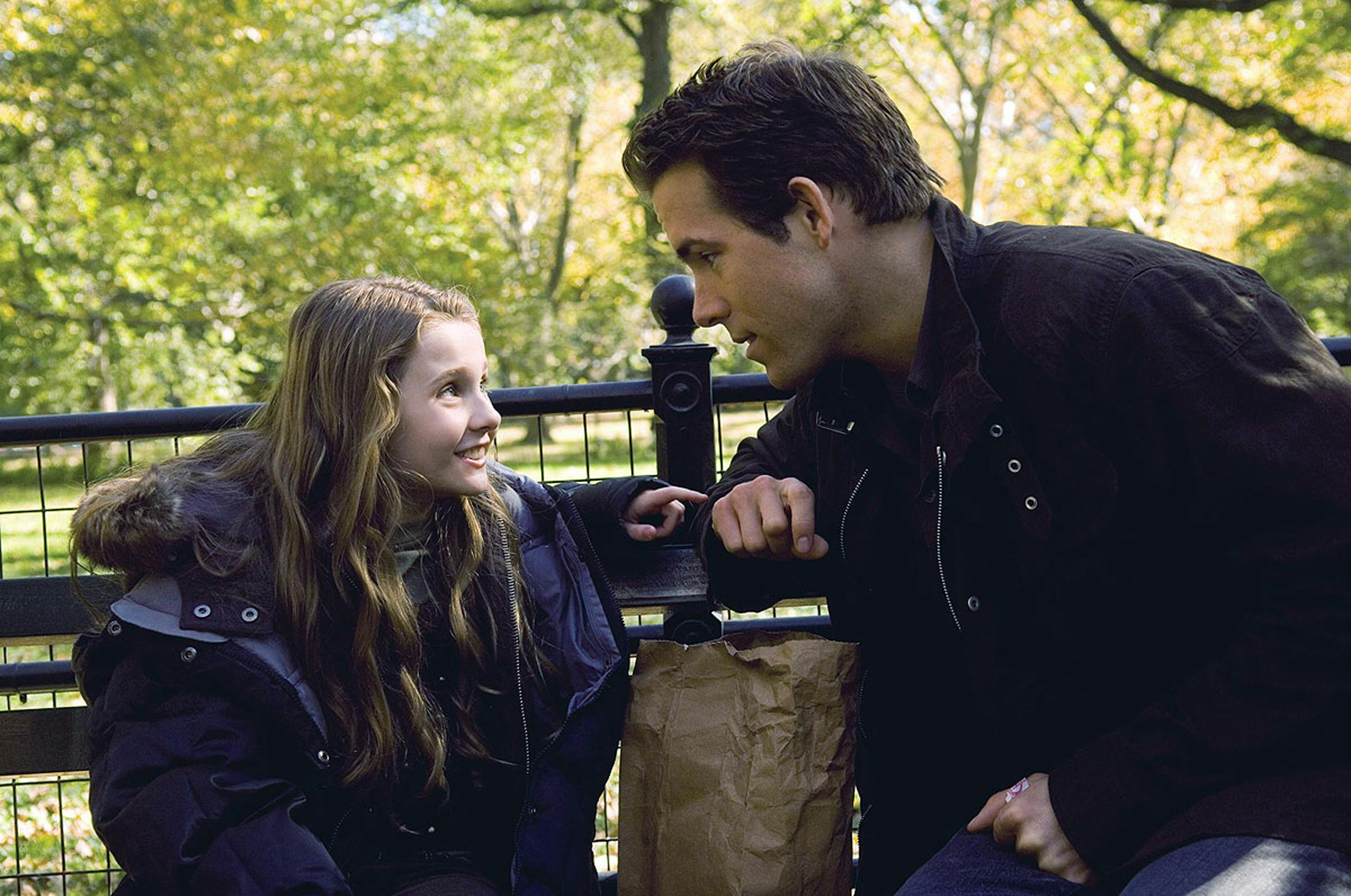 Ten-year-old Maya Hayes (Abigail Breslin) wants to know everything about how her dad, Will (Ryan Reynolds), and mother fell in love in the romantic comedy, "Definitely, Maybe," from Universal Pictures.