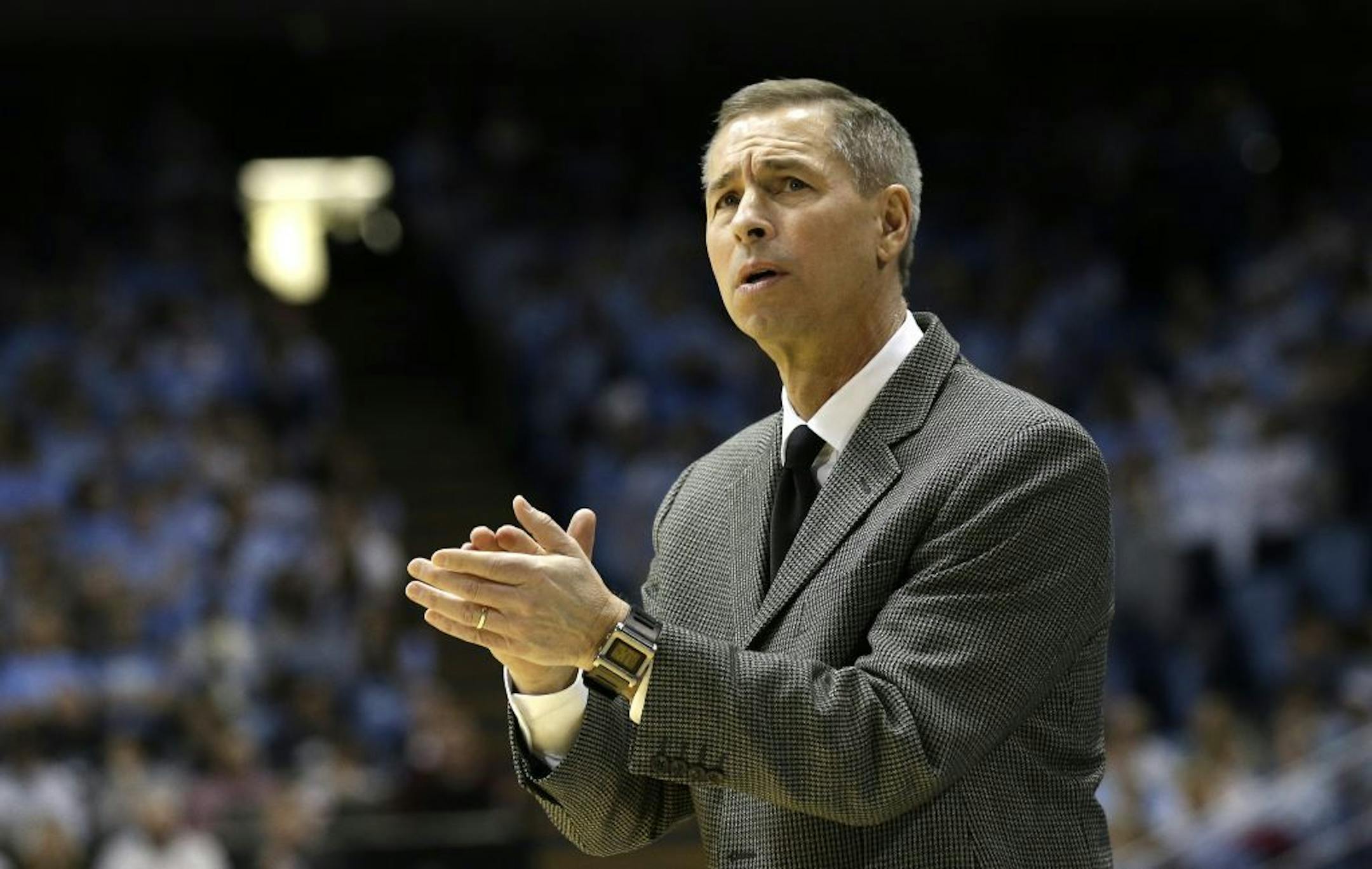 Wake Forest Jeff Bzdelik reacts during the first half of an NCAA college basketball game against North Carolina in Chapel Hill, N.C., Tuesday, Feb. 5, 2013.