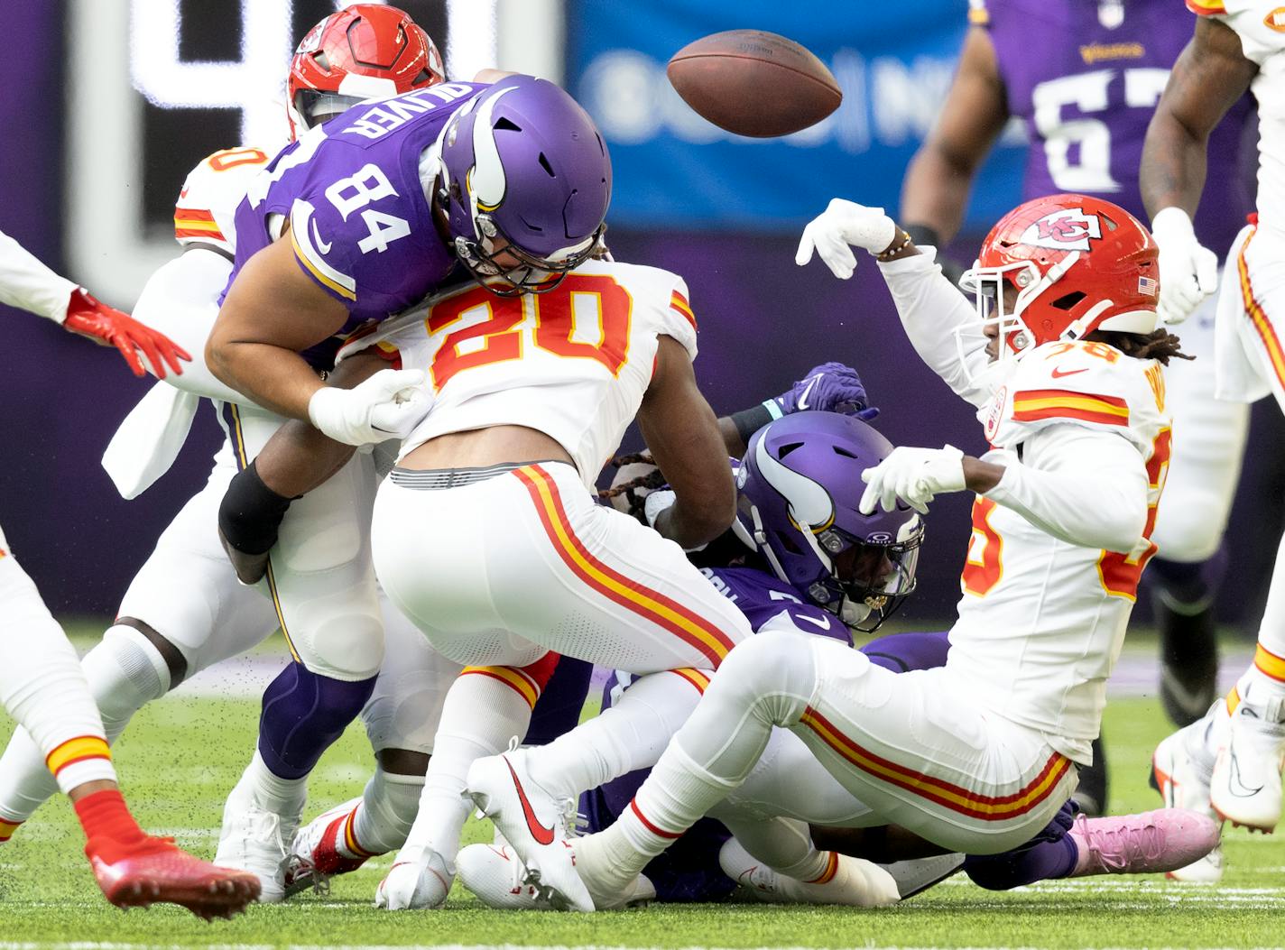 Minnesota Vikings tight end Josh Oliver (84) fumbles the ball in the first quarter Sunday, October 8, 2023, at U.S. Bank Stadium in Minneapolis, Minn. ] CARLOS GONZALEZ • carlos.gonzalez@startribune.com