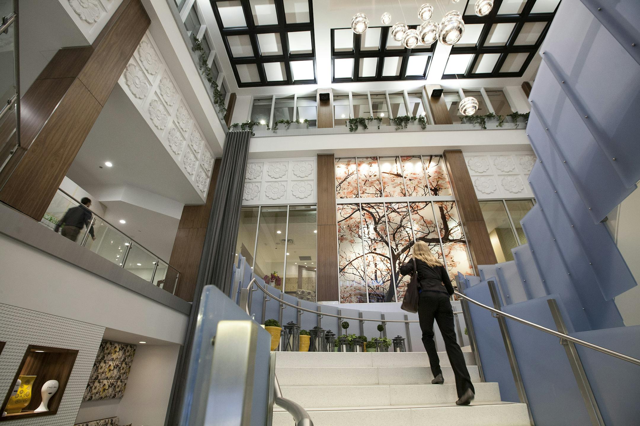 A grand marble staircase and cherry blossom art mark the entry to the historic Soo Line Building City Apartments in Minneapolis April 21, 2014. (Courtney Perry/Special to the Star Tribune)