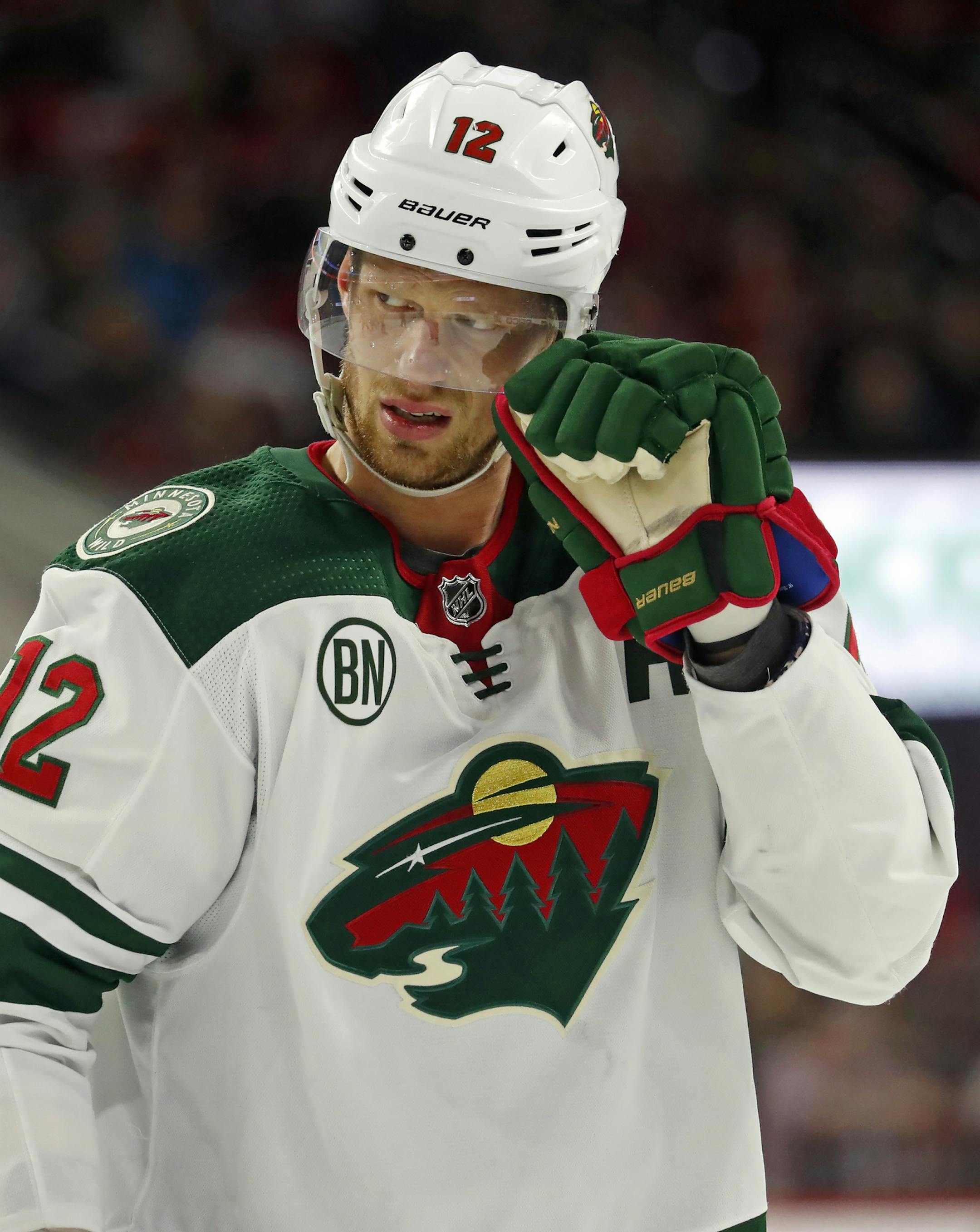Minnesota Wild's Eric Staal (12) waits for a face-off against the Carolina Hurricanes during the second period of an NHL hockey game, Saturday, March 23, 2019, in Raleigh, N.C. (AP Photo/Karl B DeBlaker)