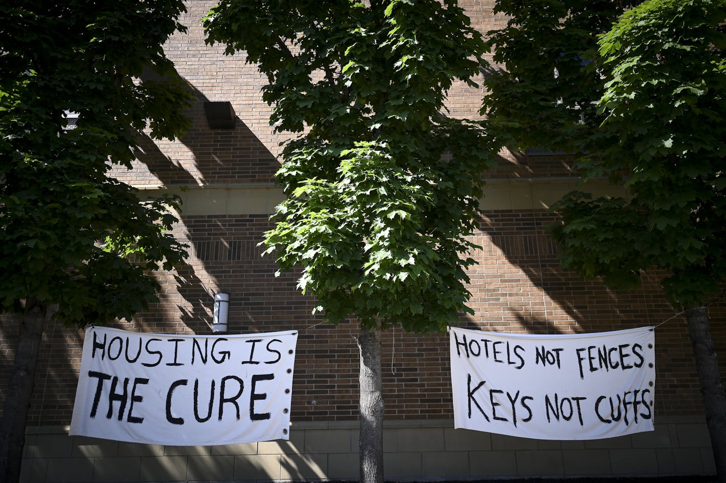 Signs outside the sanctuary hotel. ] aaron.lavinsky@startribune.com When unrest broke out on Lake Street last week, an organized group of volunteers came together to secure a space for the homeless on the streets that were potentially in danger. That hotel became the Midtown Sheraton, which has since been turned into a sanctuary, with volunteers working around the clock to house and care for more than 200 people. They see it as a model of what the community can accomplish when given the necessar