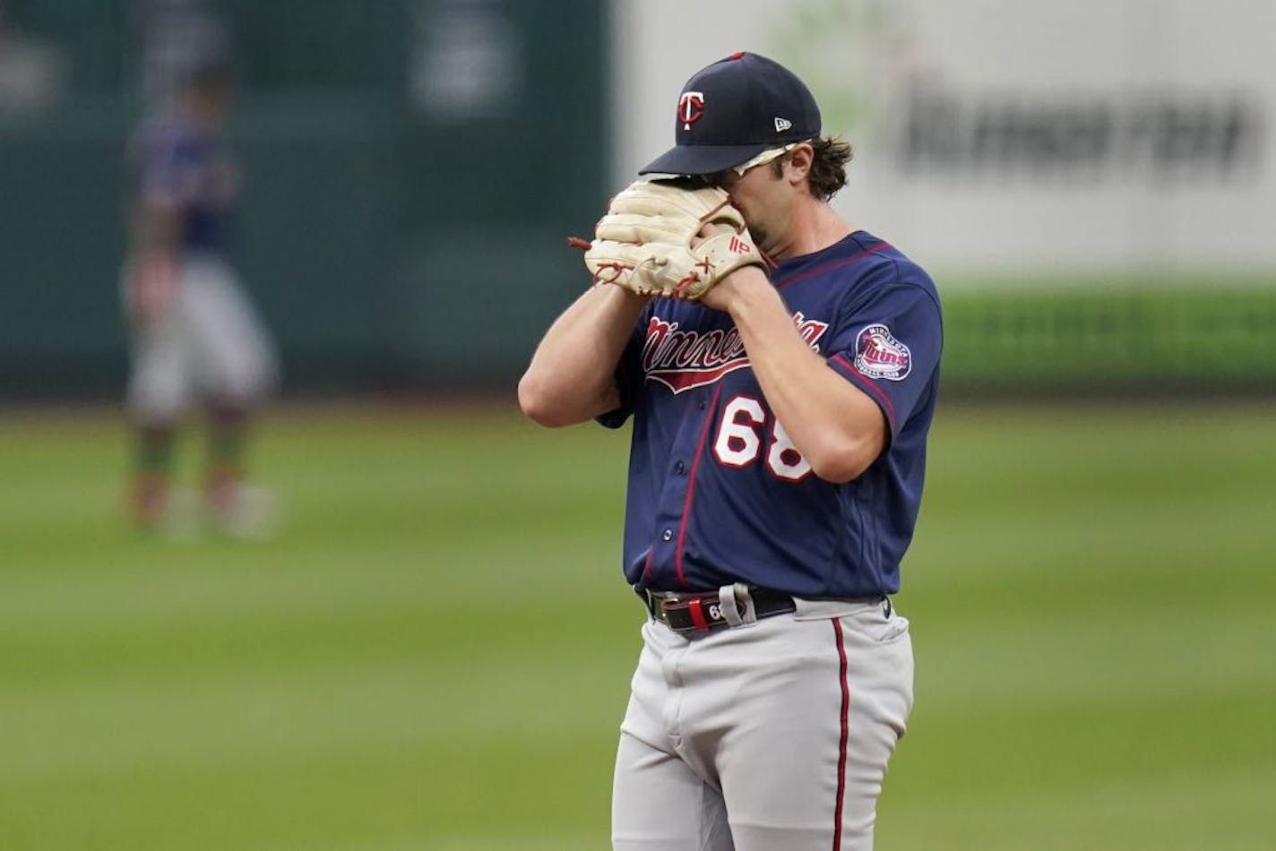 Minnesota Twins starting pitcher Randy Dobnak pauses on the mound before being removed during the third inning in the second game of a baseball doubleheader against the St. Louis Cardinals Tuesday, Sept. 8, 2020, in St. Louis.