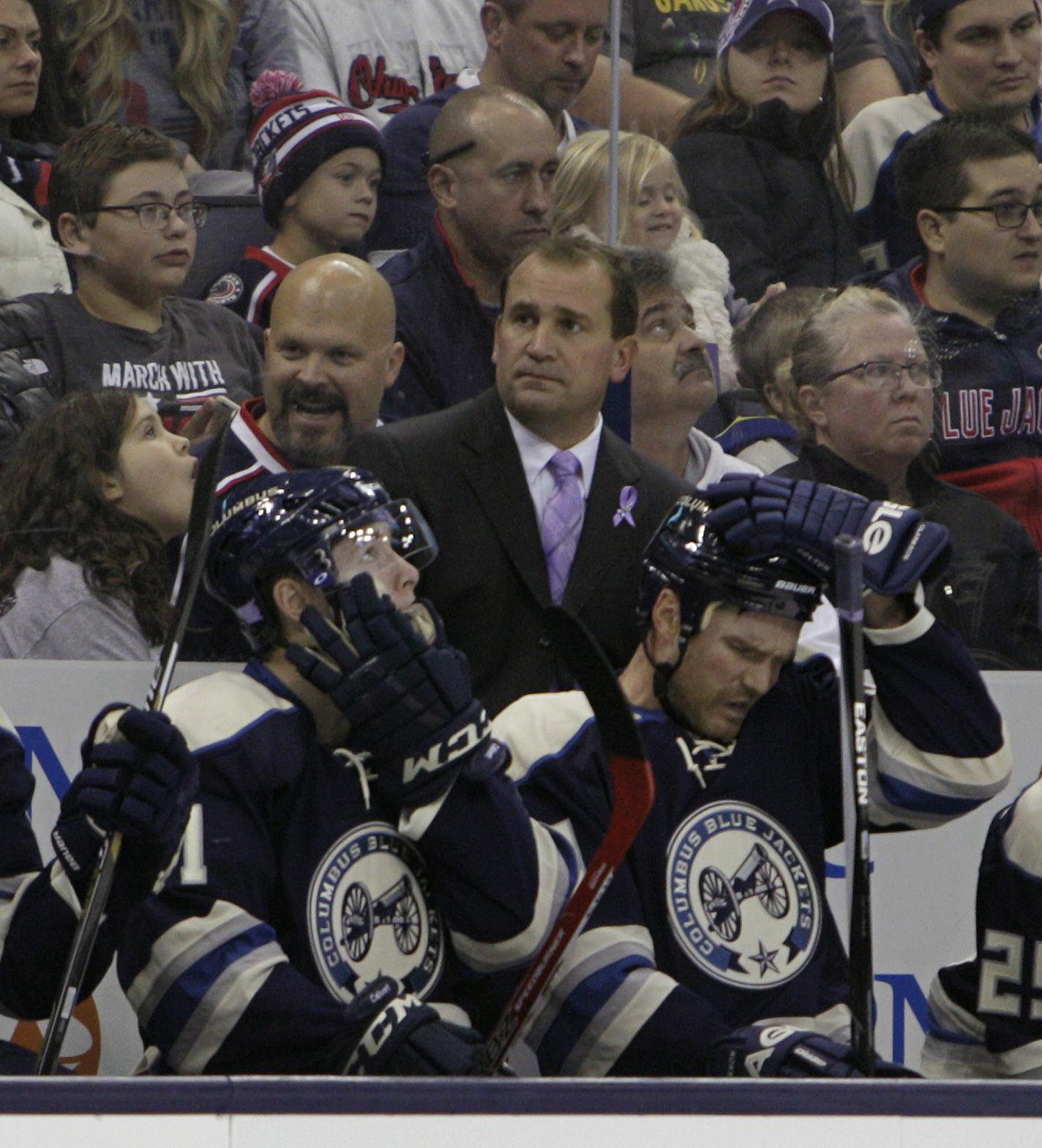 Columbus Blue Jackets head coach Todd Richards on the bench during their 4-0 loss to the New York Islanders in an NHL hockey game Tuesday, Oct. 20, 2015, in Columbus, Ohio. After an 0-7 start, the Blue jackets have fired coach Todd Richards and replaced him with John Tortorella, Wednesday, Oct. 21, 2015. (AP Photo/Jay LaPrete)