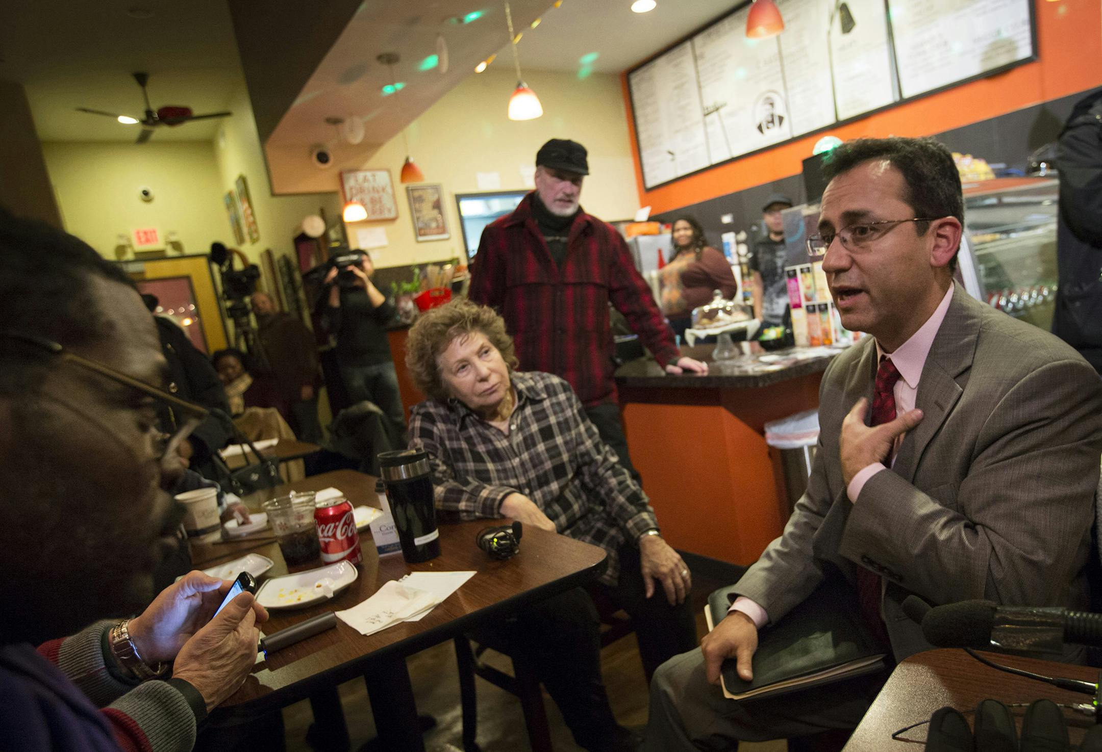 Sergio Paez spoke to the media and members of the public that showed up to question him in his continuing mission to secure the job of superintendent of Minneapolis Public Schools at Sammy'a Avenue Eatery on Tuesday, January 5, 2015, in Minneapolis, Minn. ] RENEE JONES SCHNEIDER &#x2022; reneejones@startribune.com The woman at left is Ruth Usen who came to ask some questions. ORG XMIT: MIN1601051918590916