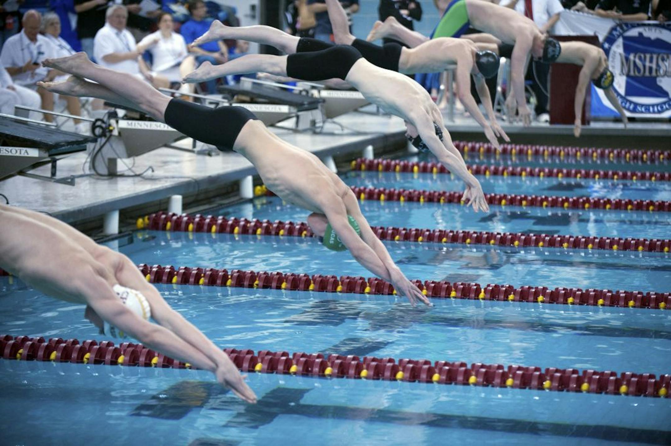 Mounds View Junior Noah Lucas (green swim cap)