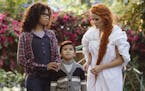 This image released by Disney shows Storm Reid, from left, Deric McCabe and Reese Witherspoon in a scene from "A Wrinkle In Time." (Atsushi Nishijima/