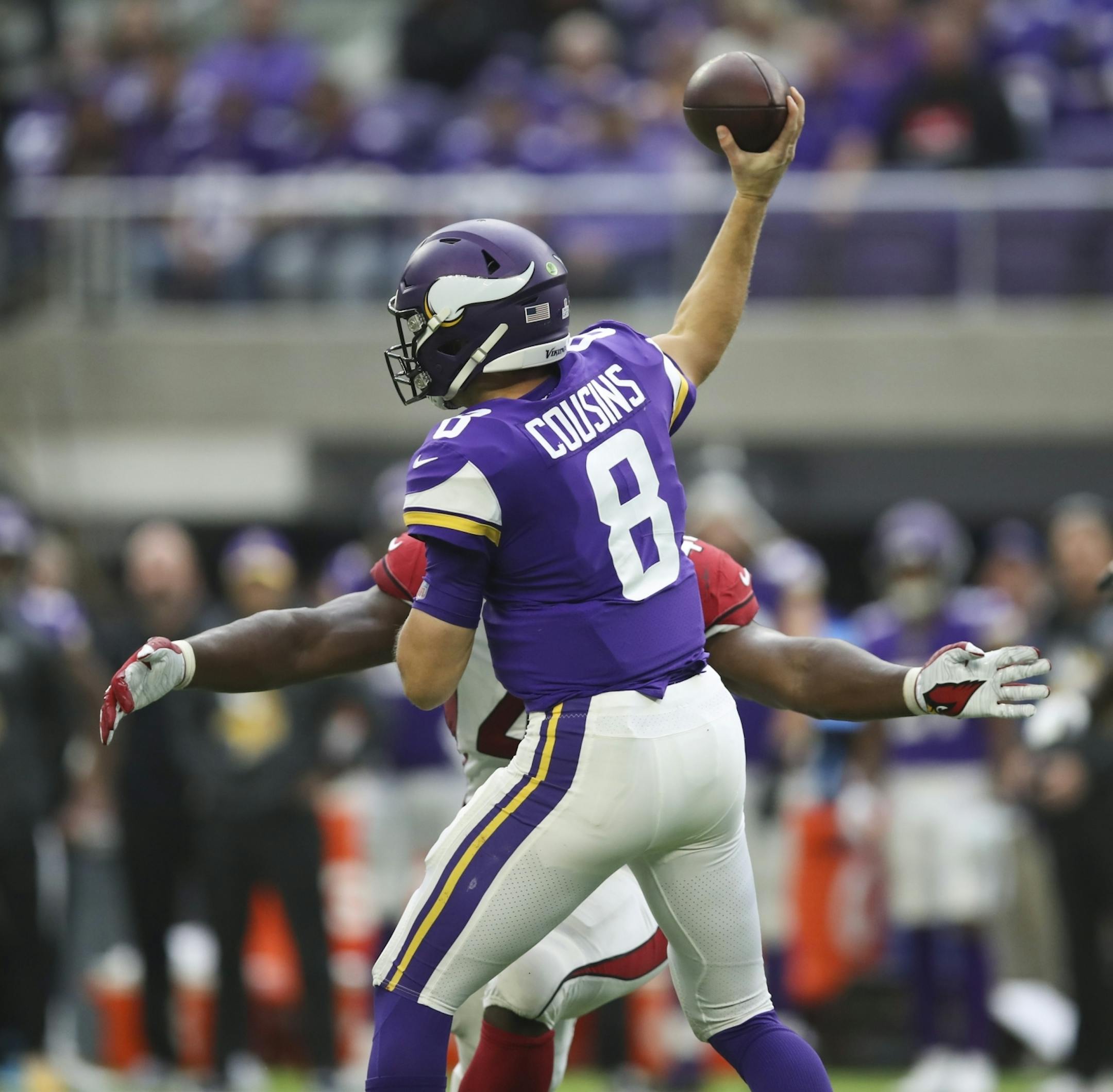 Minnesota Vikings quarterback Kirk Cousins threw under pressure during the Vikings' final possession of the first half.