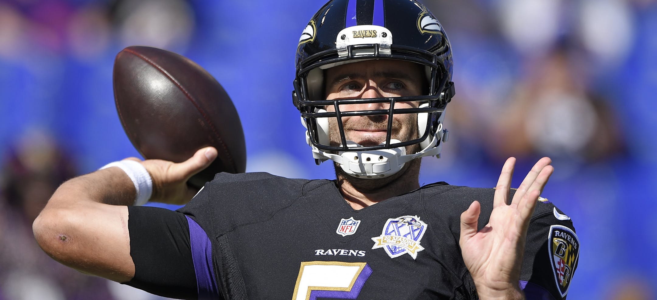 Baltimore Ravens quarterback Joe Flacco warms up before an NFL football game against the Cleveland Browns, Sunday, Oct. 11, 2015, in Baltimore. (AP Photo/Nick Wass)