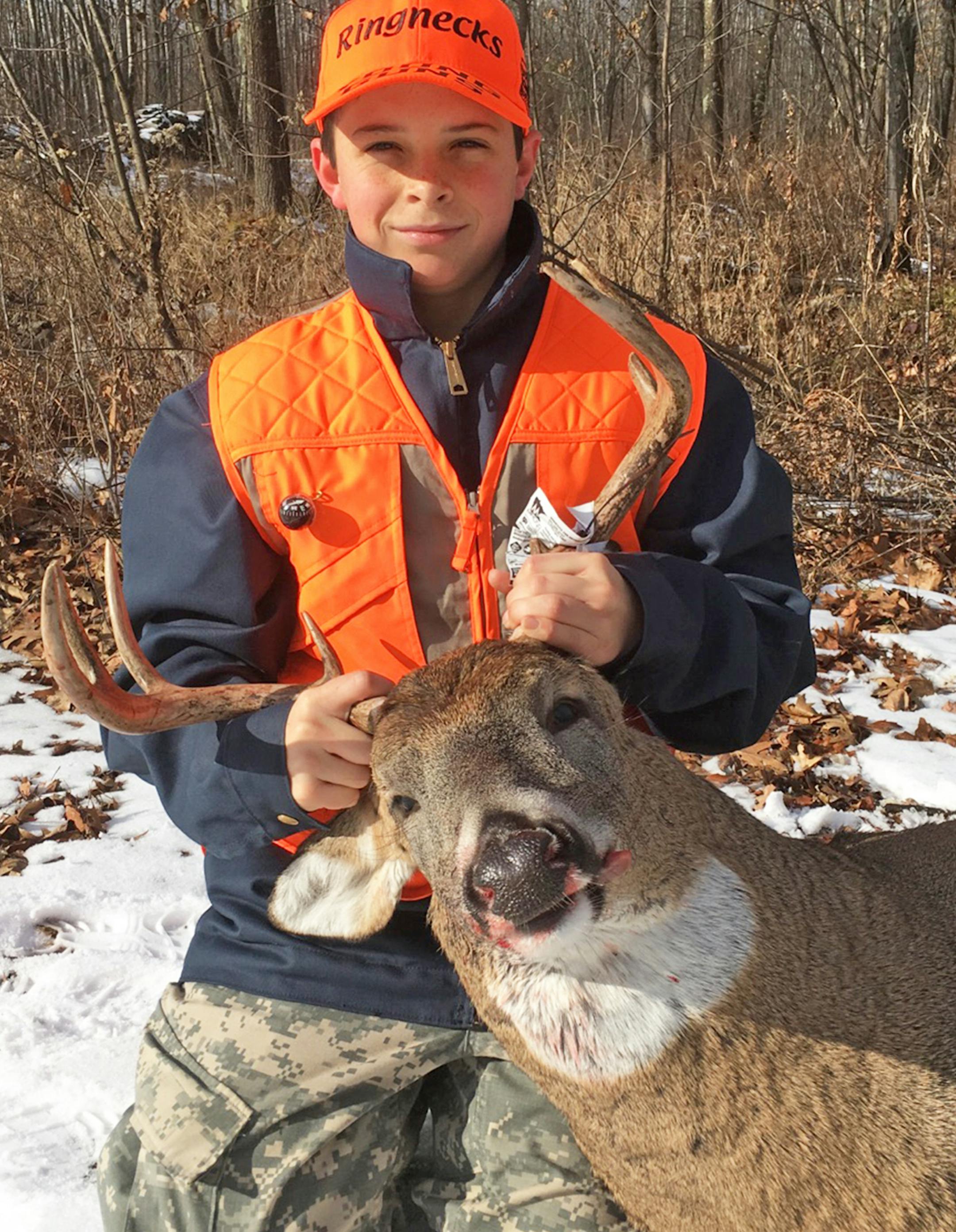 Ethan Zdon, 14, from Isanti, shot this 8-point buck Sunday morning of the second weekend of the firearms season. He was hunting near Ogilvie and using his grandfatherís Swedish Mauser bolt-action rifle. This was his 3rd year of deer hunting. (Submitted by Stan Zdon)
