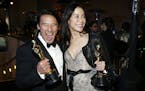 Jimmy Chin, left, and Elizabeth Chai Vasarhelyi, winners of the award for best documentary feature for "Free Solo", attend the Governors Ball after th